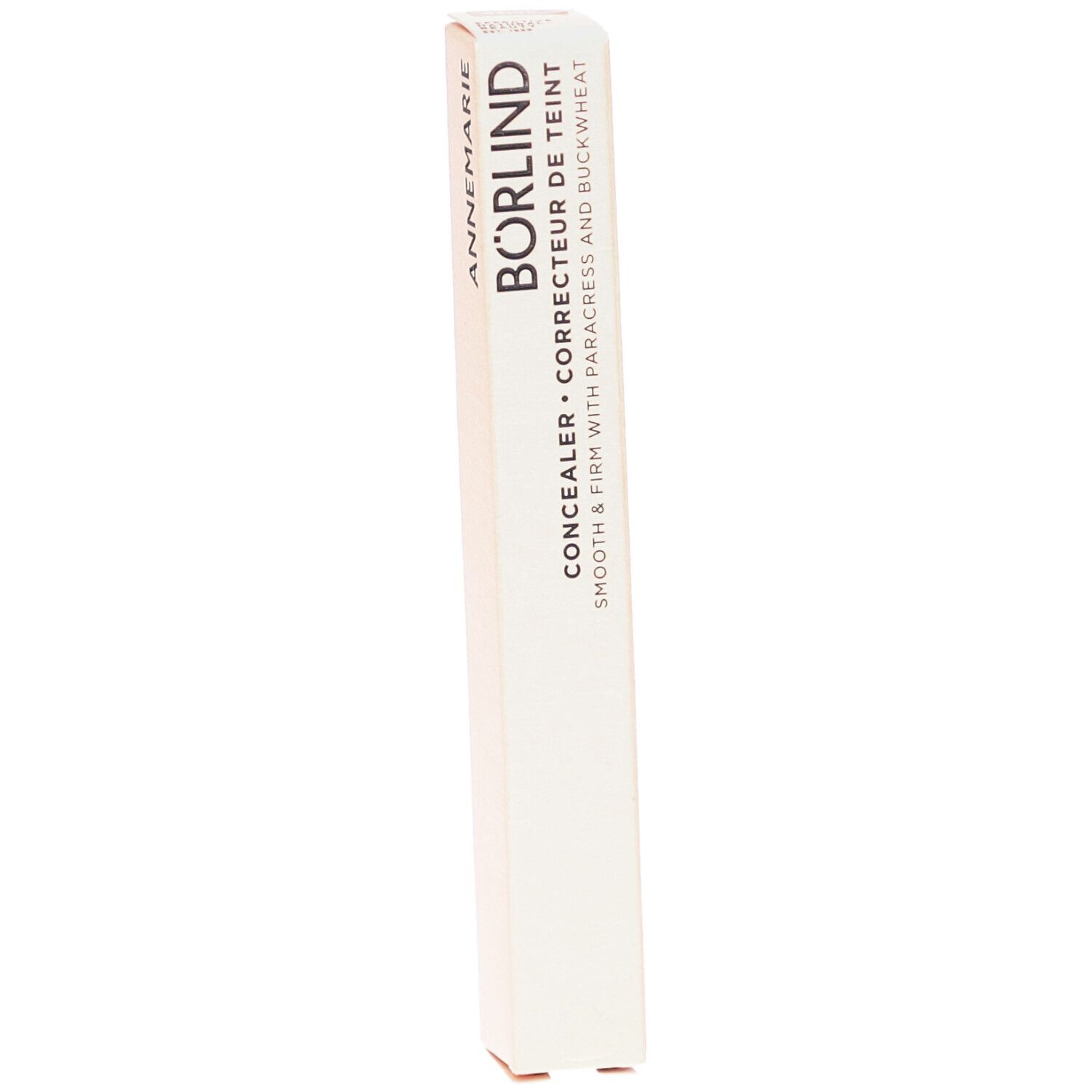 Emballage de correcteur BÖRLIND. Boîte beige allongée. Inscription : ANNEMARIE BÖRLIND, Concealer, Correcteur de teint.