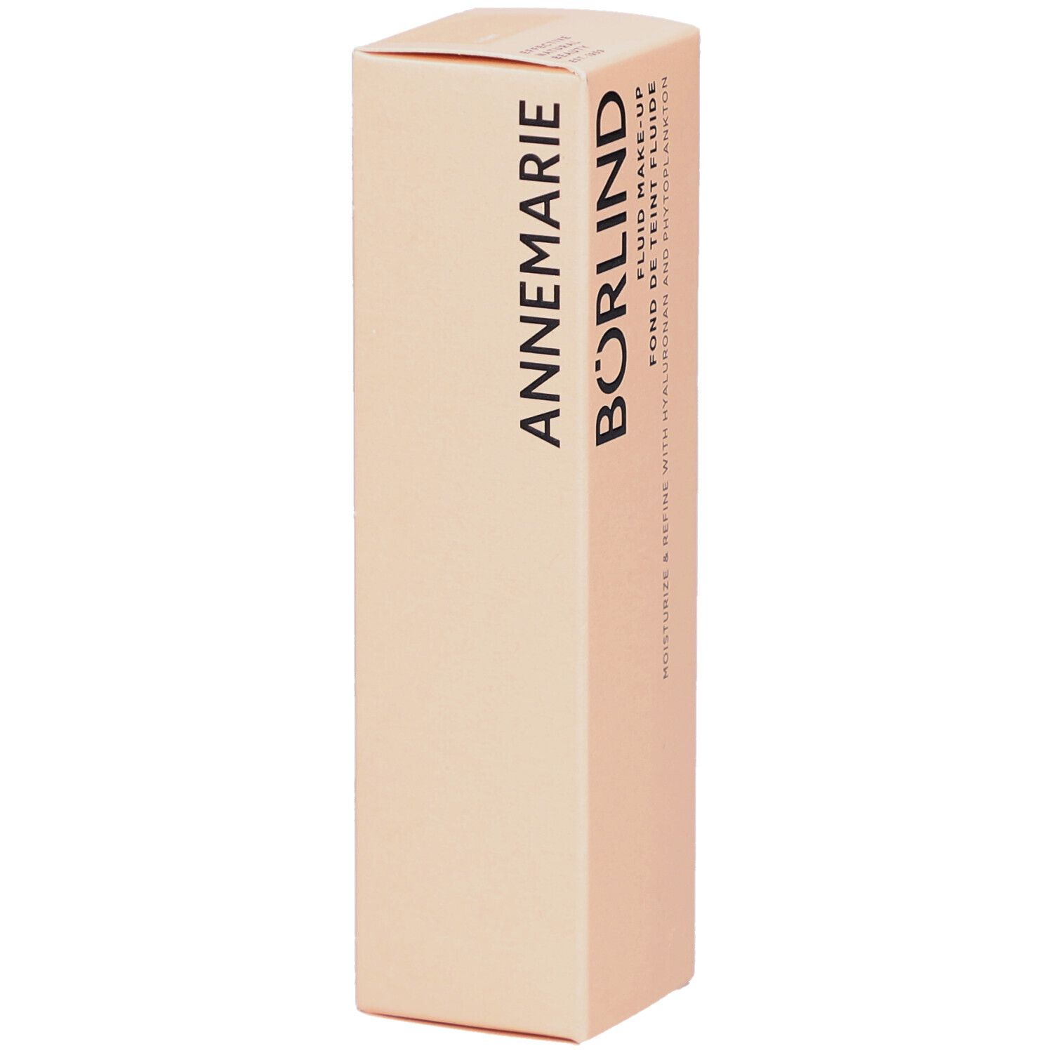 Boîte en carton beige. Inscription: ANNEMARIE BÖRLIND. Nom du produit non visible. Emballage de maquillage fluide.