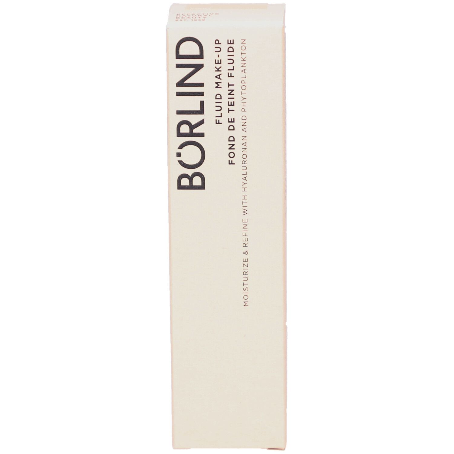 Boîte en carton beige. Inscription: BÖRLIND, FLUID MAKE-UP, FOND DE TEINT FLUIDE. Contient de l'acide hyaluronique et du phytoplancton.