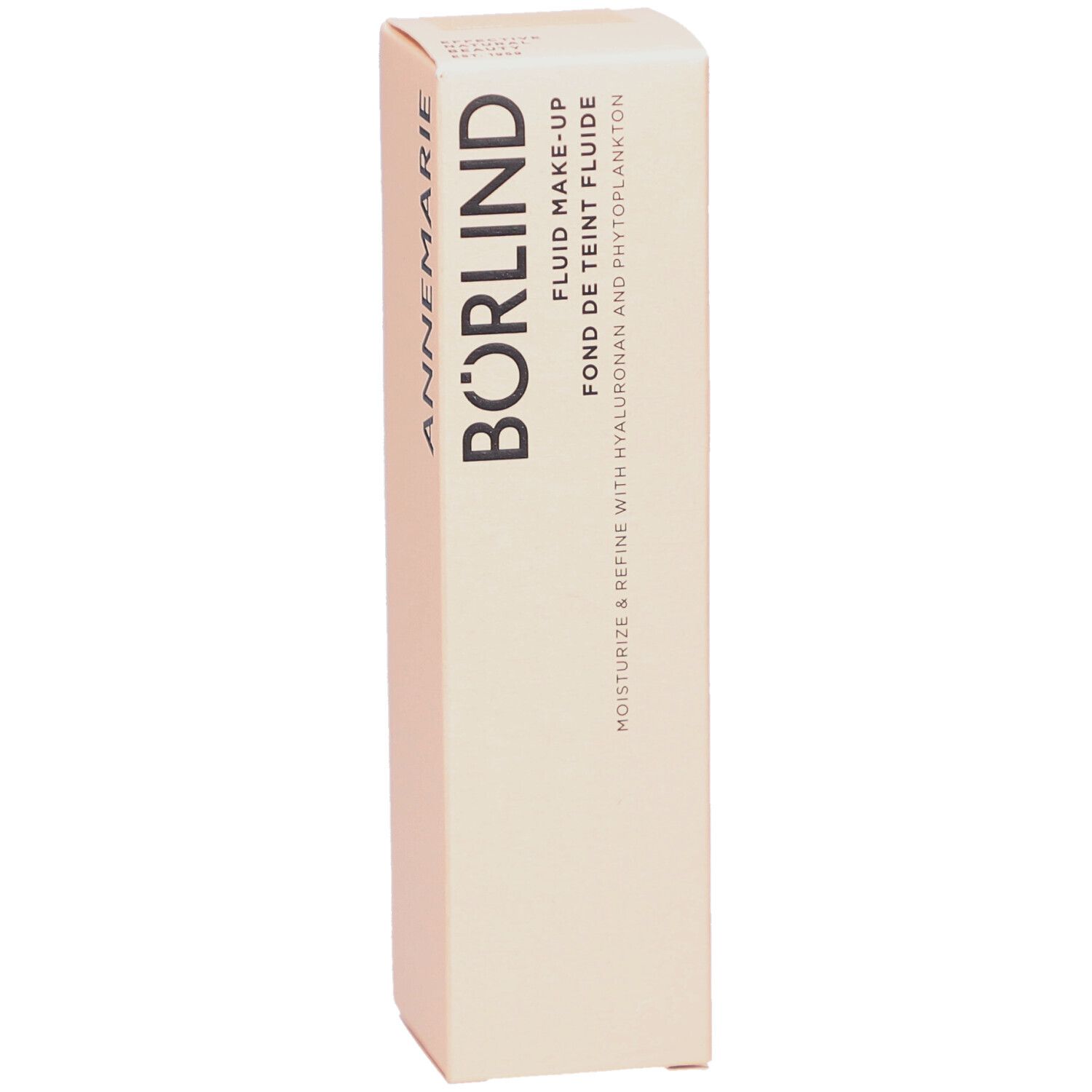 Boîte en carton beige. Inscription: ANNEMARIE BÖRLIND, FLUID MAKE-UP, FOND DE TEINT FLUIDE. Contient de l'acide hyaluronique et du phytoplancton.
