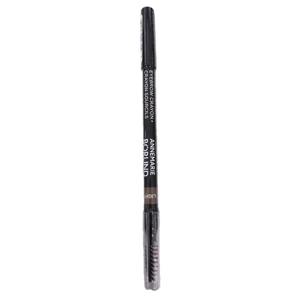 Crayon à sourcils BÖRLIND. Crayon brun foncé avec brosse. Inscription: Eyebrow Crayon, Light. Emballé dans du film.