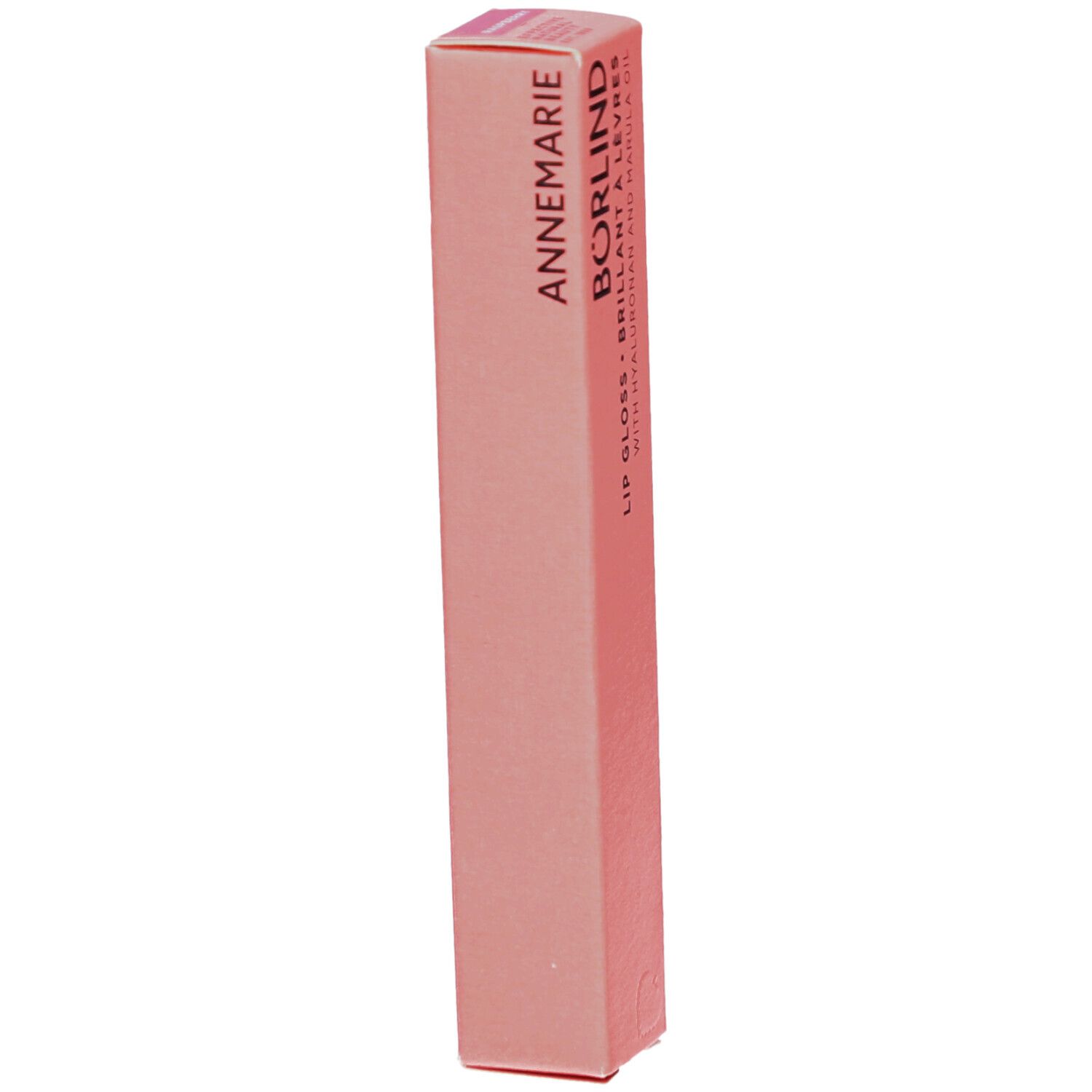 Emballage rose avec informations produit. Inscription: ANNEMARIE BÖRLIND, Lipgloss.