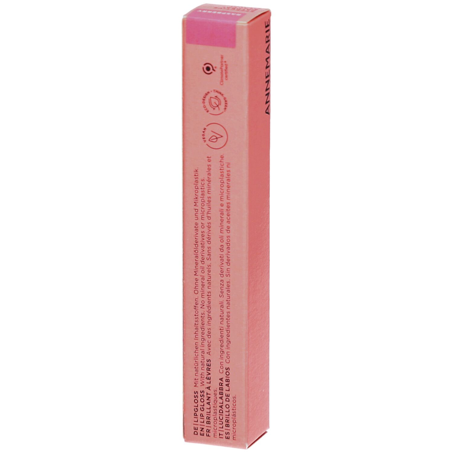 Tube de gloss avec bouchon noir. Texture rose scintillante visible.