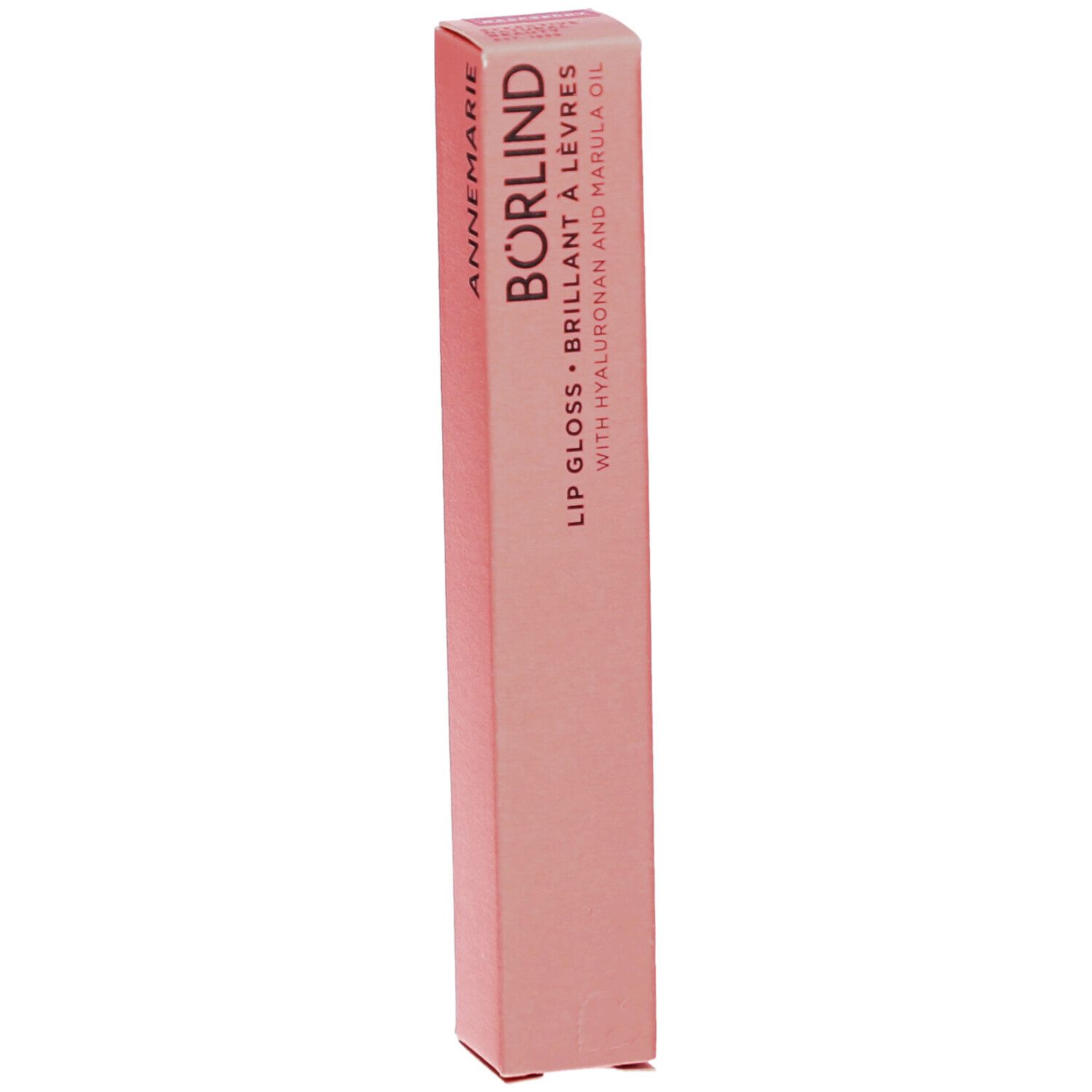 Emballage rose avec informations produit. Inscription: ANNEMARIE BÖRLIND, Lipgloss, avec acide hyaluronique et huile de marula.
