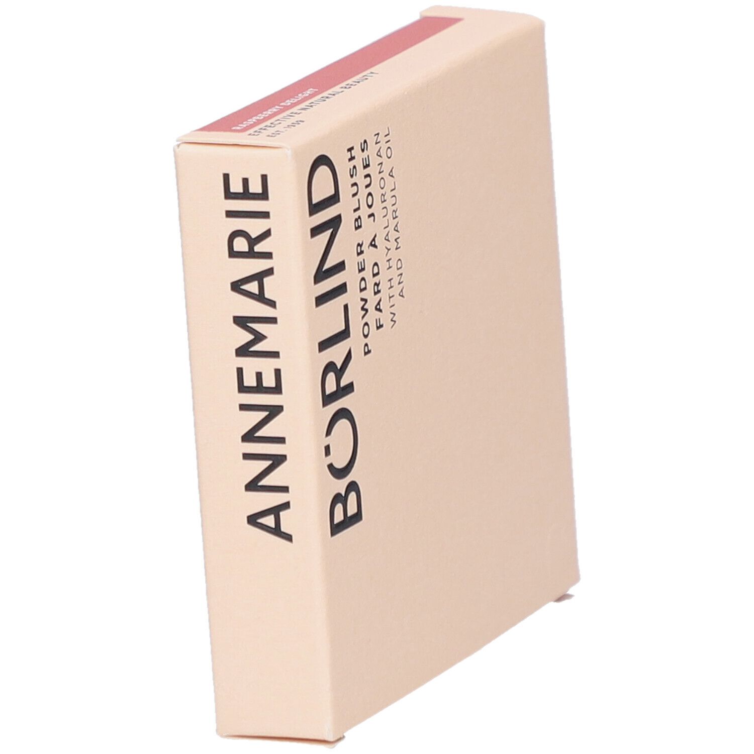 Boîte en carton beige inclinée. Inscription : ANNEMARIE BÖRLIND, Powder Blush, Fard à Joues, avec Hyaluron et huile de Marula.
