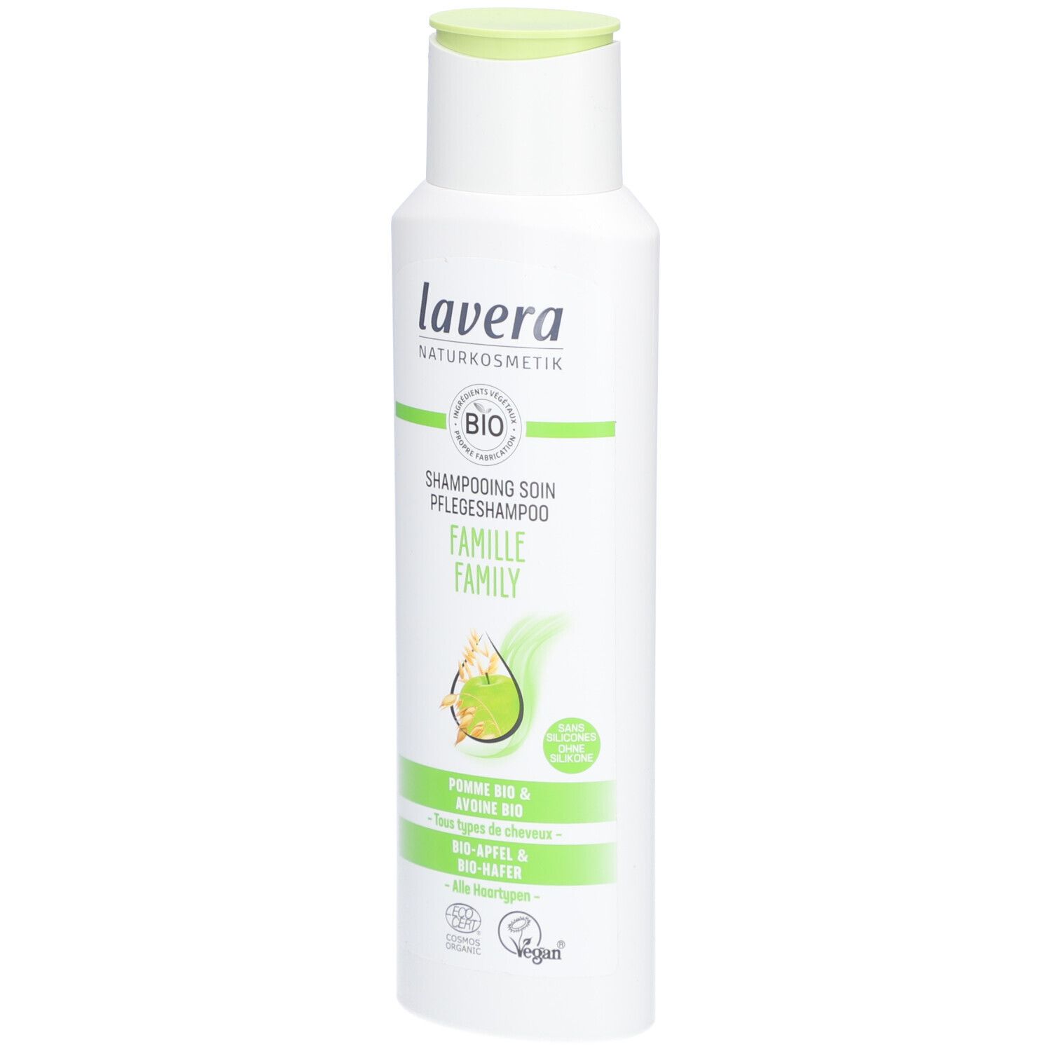 Flacon blanc, bouchon vert. Inscription: lavera, BIO, Pflegeshampoo Familie. Illustration pomme et avoine.