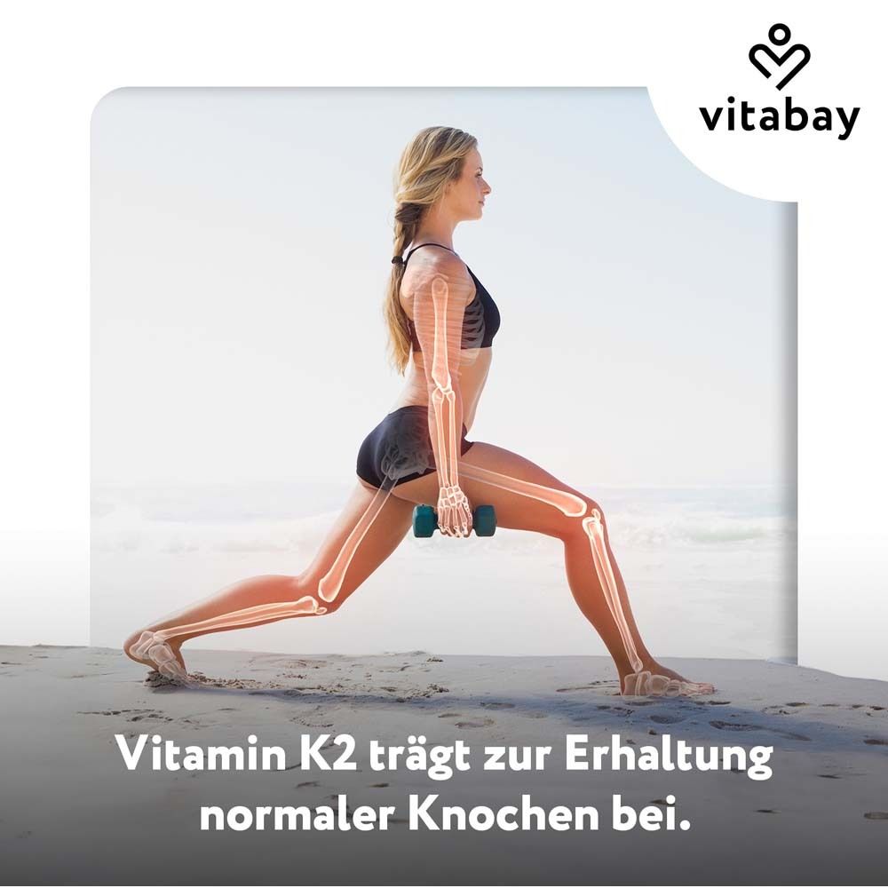 Femme en fente. Illustration squelettique. Inscription : Vitamine K2. Marque : vitabay.