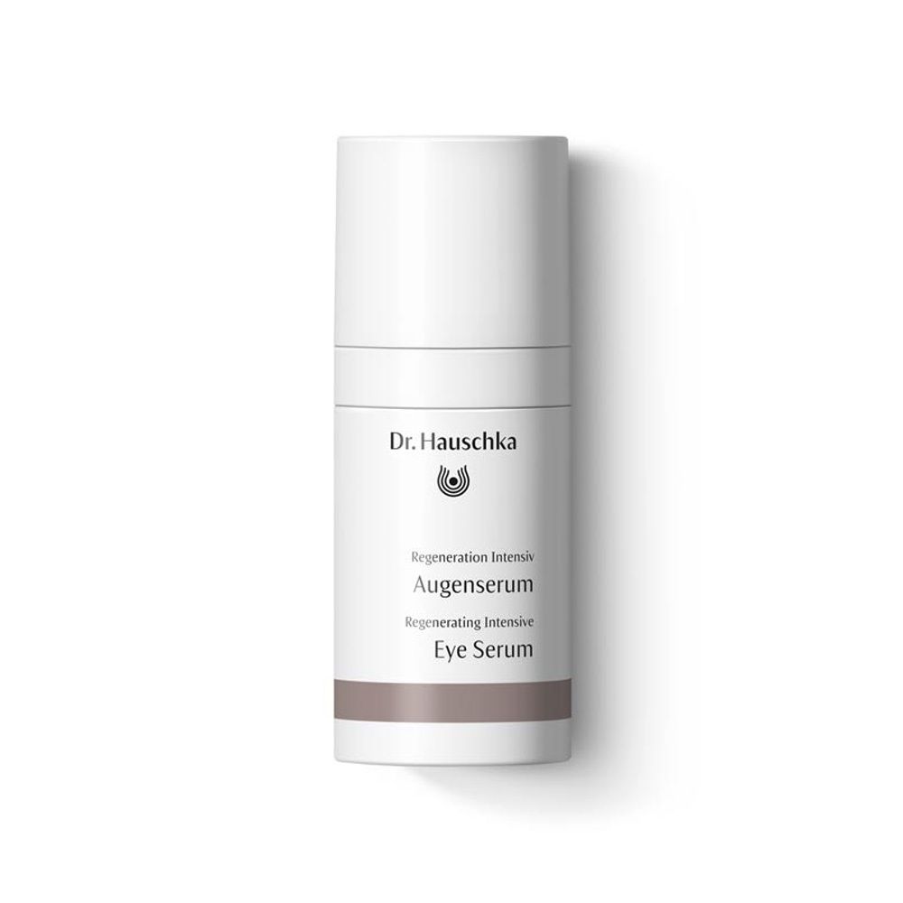 Flacon cylindrique blanc avec texte Dr. Hauschka, Regeneration Intensiv Augenserum, Eye Serum. Bande marron en bas.