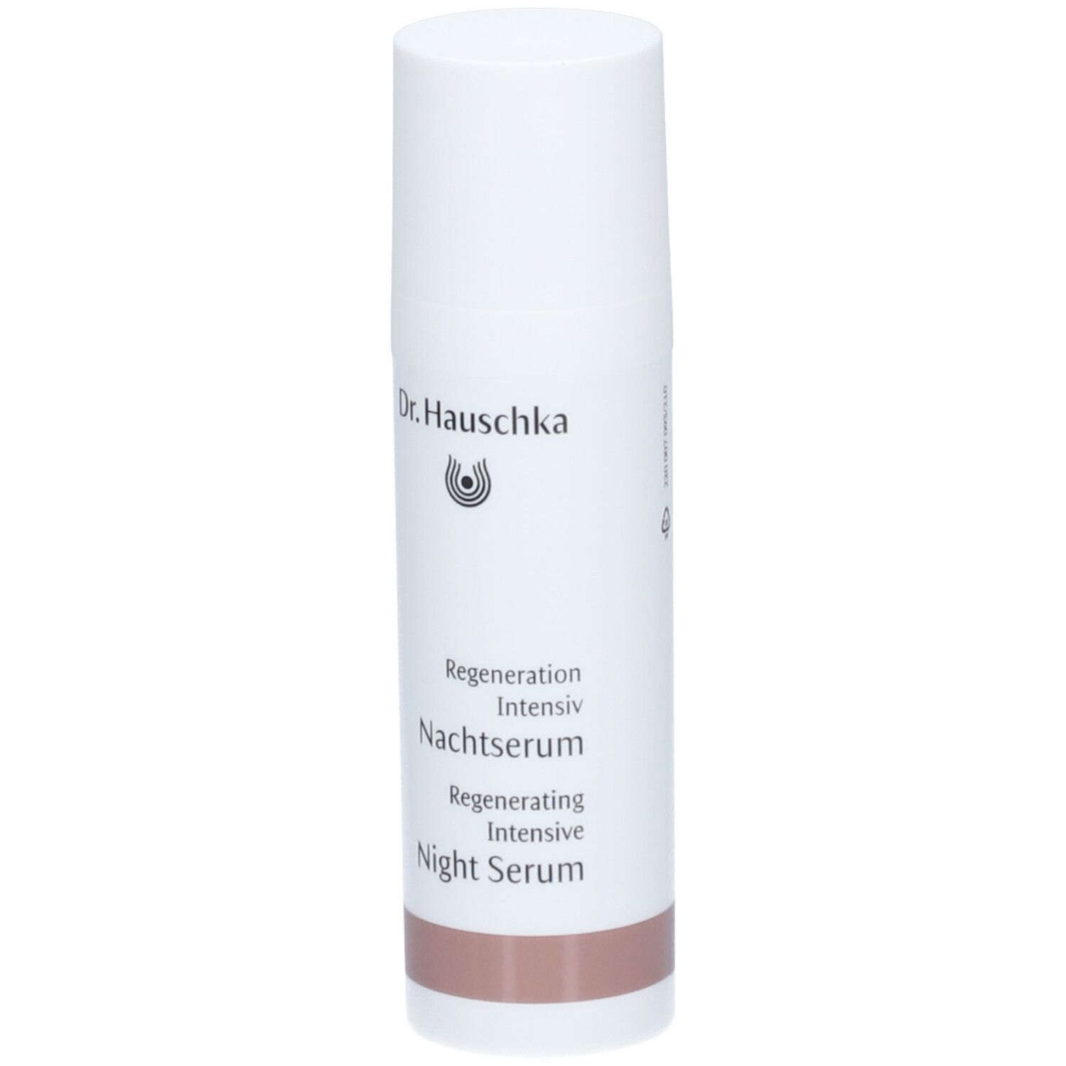 Flacon blanc Dr. Hauschka, sérum de nuit régénérant. Inscription et bande marron en bas.