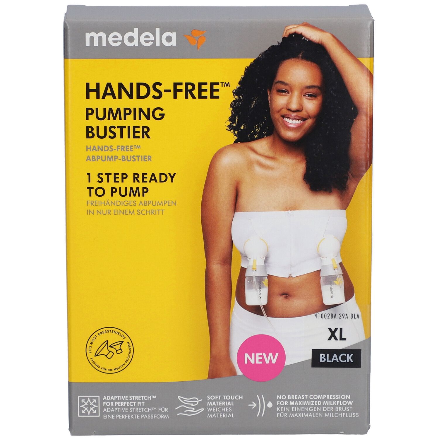 Boîte avec image du produit. Bustier mains libres, noir, XL. Marque Medela. Inscriptions : Hands-free, Abpump-Bustier, 1 Step Ready to Pump.