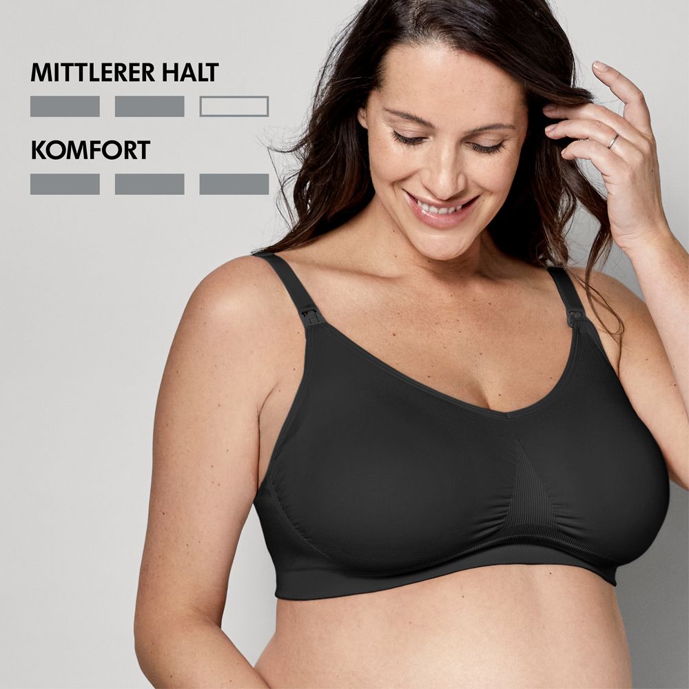 Femme portant un soutien-gorge d'allaitement noir. Texte : Soutien modéré, confort.