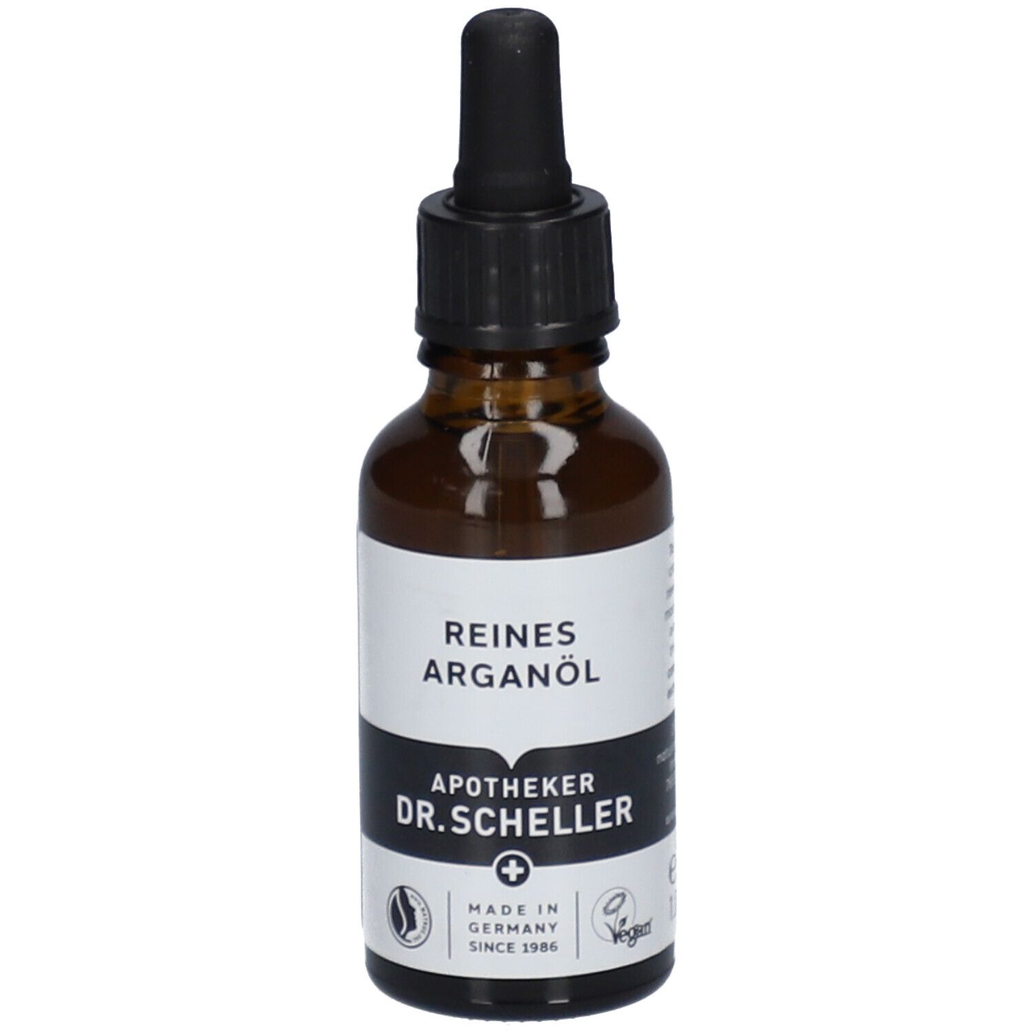 Flacon en verre brun avec bouchon noir et pipette. Étiquette avec "REINES ARGANÖL" et "APOTHEKER DR.SCHELLER".