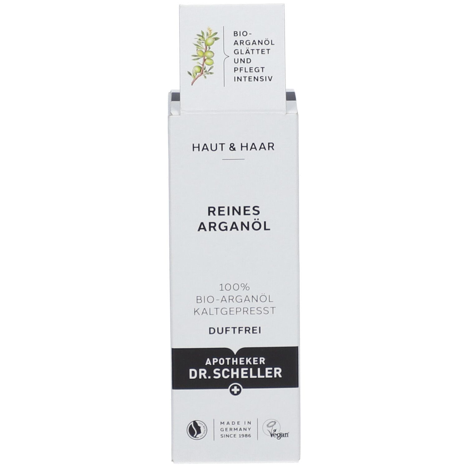 Emballage du produit. Boîte avec "HAUT & HAAR" et "REINES ARGANÖL". Illustration de branche d'argan.