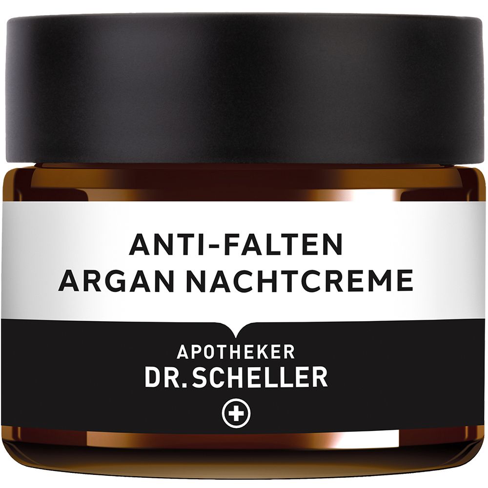 Pot de crème de nuit anti-rides à l'argan. Verre brun, couvercle noir. Étiquette blanche avec nom du produit.