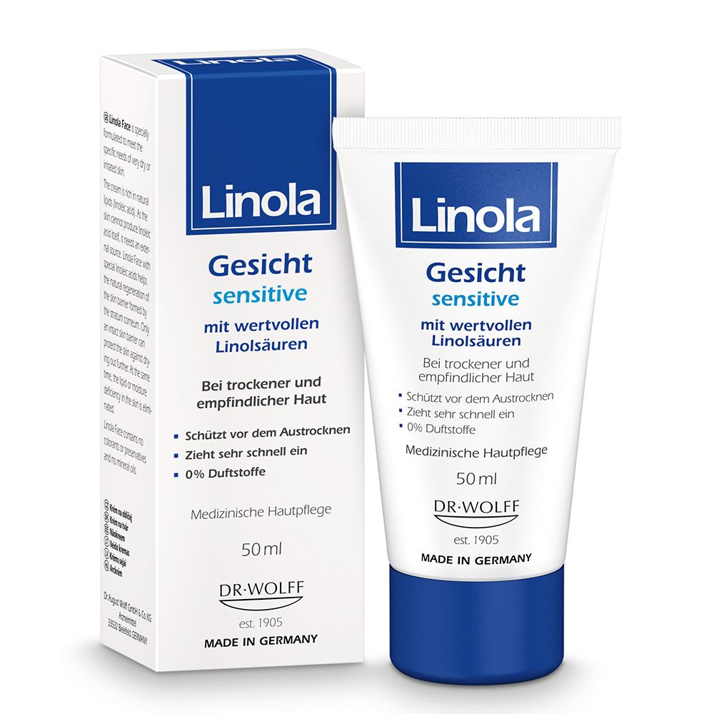 Crème Linola Gesicht sensitive et emballage. Tube blanc et boîte avec texte bleu. Soin médical de la peau.