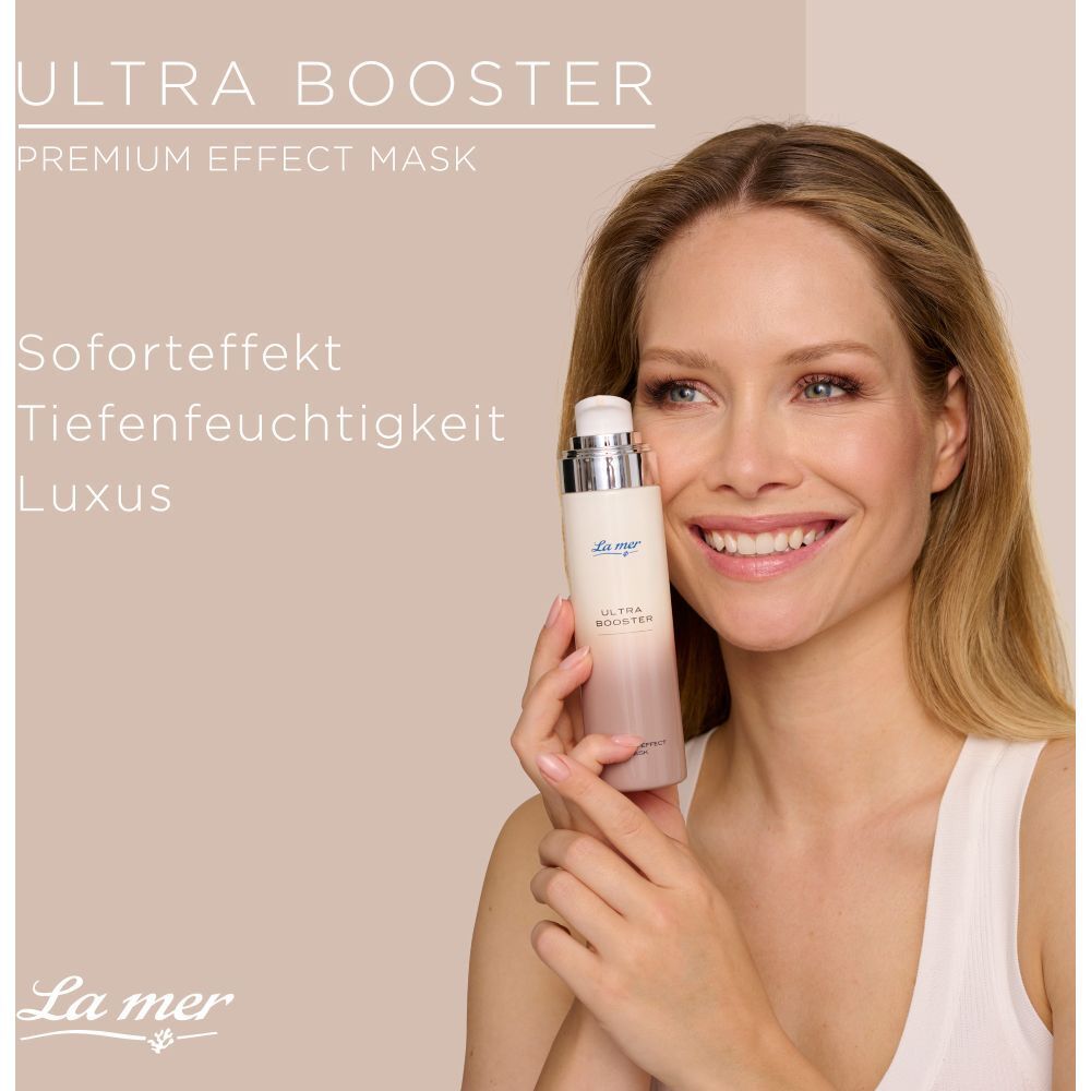 Femme tenant La mer ULTRA BOOSTER. Flacon avec vaporisateur. Texte : Effet immédiat, hydratation intense, luxe.