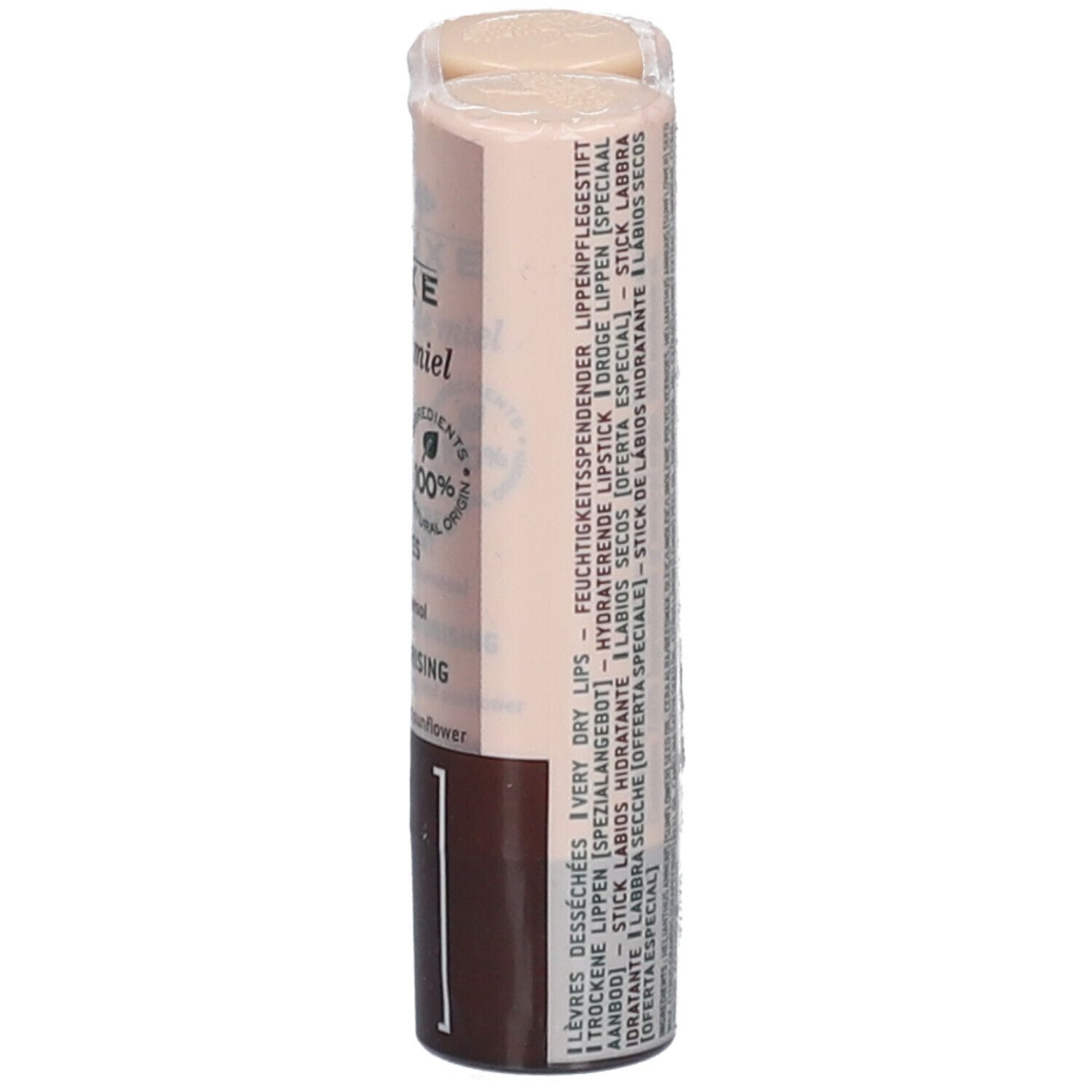 NUXE rêve de miel® stick lèvres, emballage double. Vue latérale de l'emballage. Nom du produit et informations partiellement visibles.