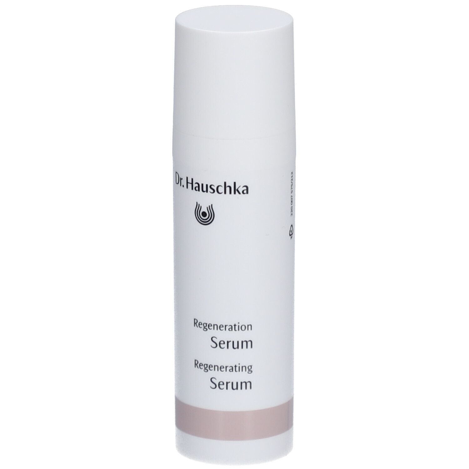Flacon blanc avec texte Dr. Hauschka et Regeneration Serum. Base rose.
