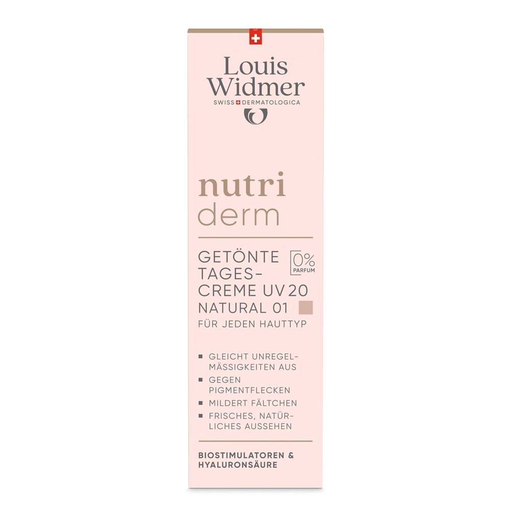 Emballage rose du produit. Texte : Nutriderm, Crème de jour teintée UV 20, Natural 01. 0% parfum. Pour tous types de peau.