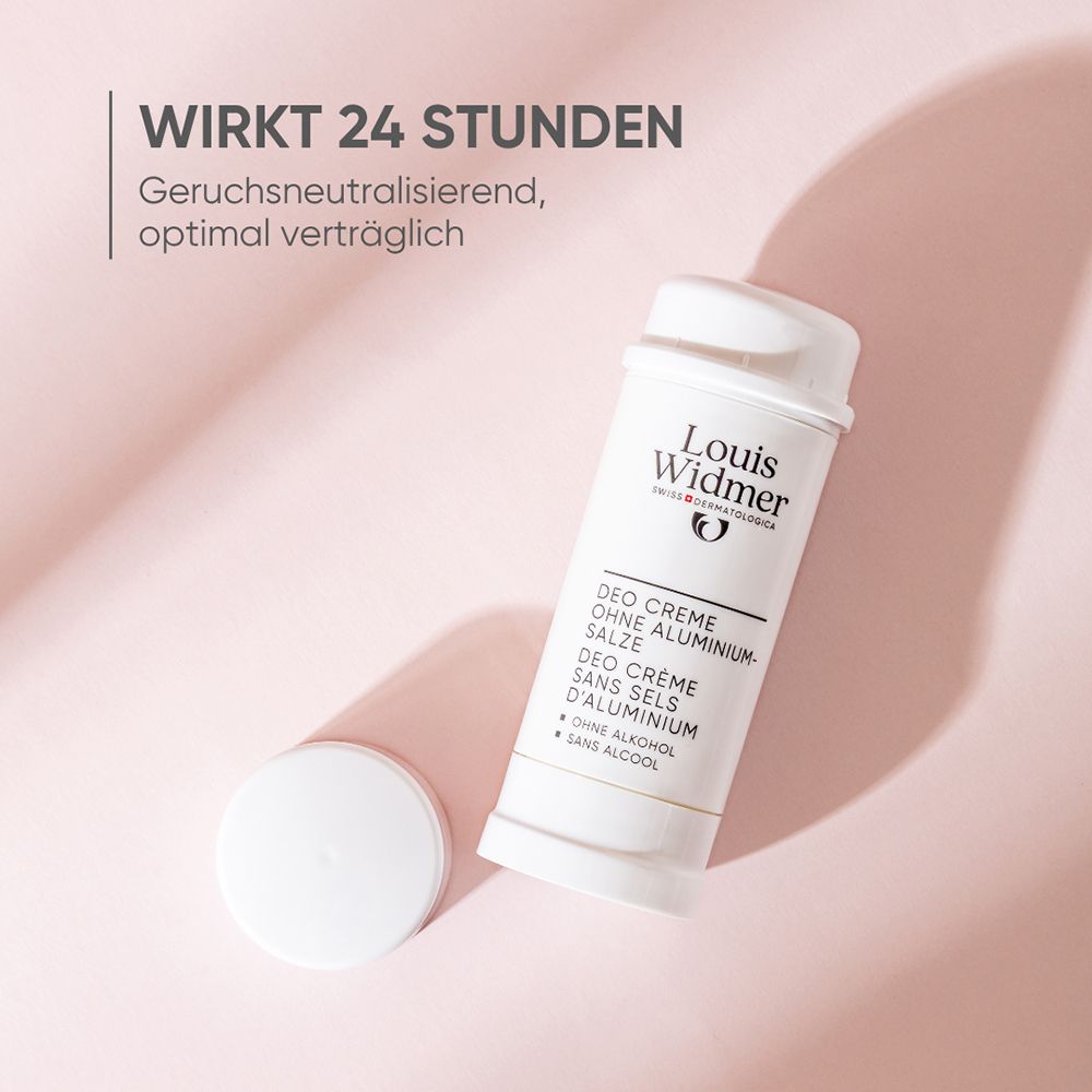 Tube de crème déodorante blanche Louis Widmer, couvercle ouvert à côté. Texte : "Agit 24 heures".