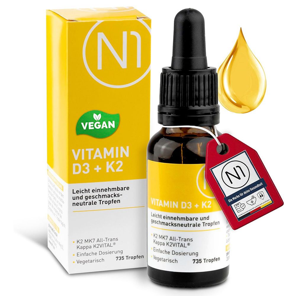 Flacon en verre brun avec bouchon noir et emballage jaune. Inscription : Vitamine D3 + K2.