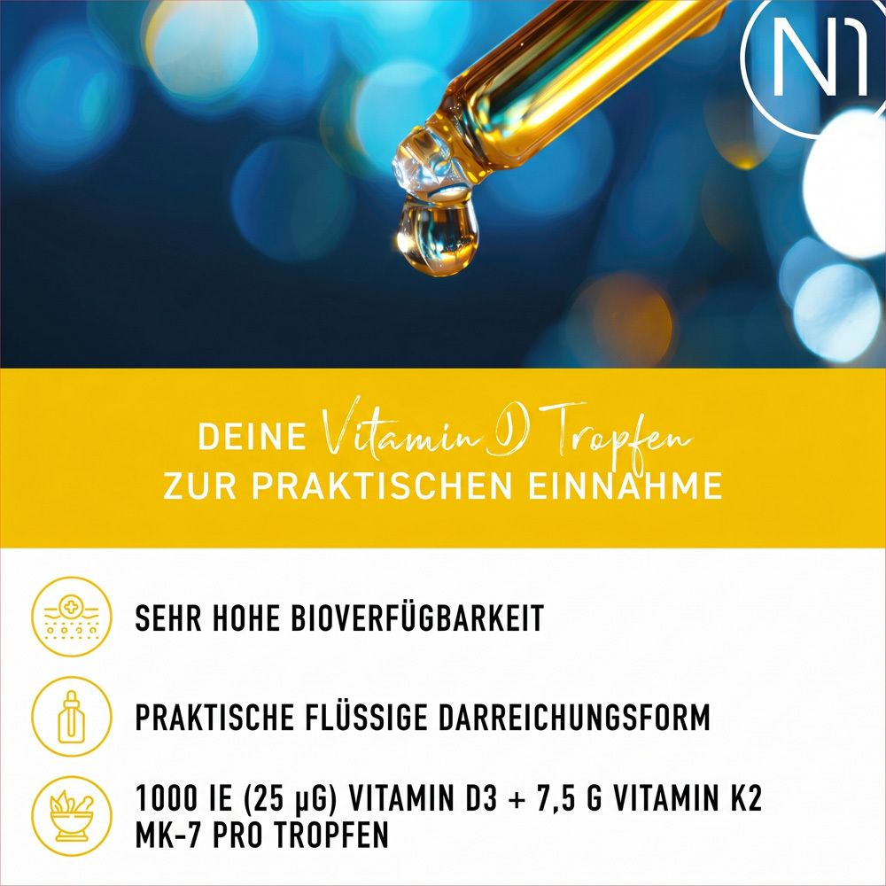 Gros plan sur une pipette. Embout en caoutchouc noir, tube en verre transparent.