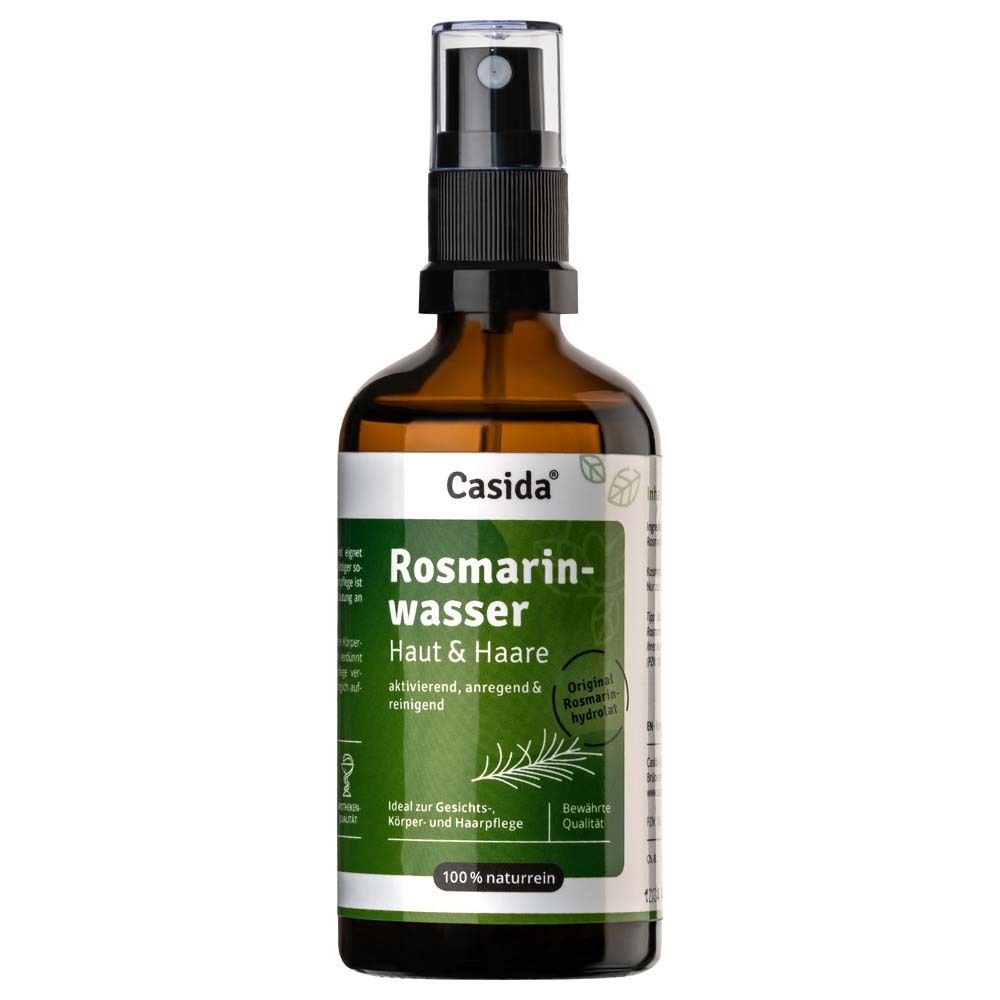 Flacon en verre brun avec vaporisateur noir. Étiquette avec nom du produit et logo. 100% naturel.