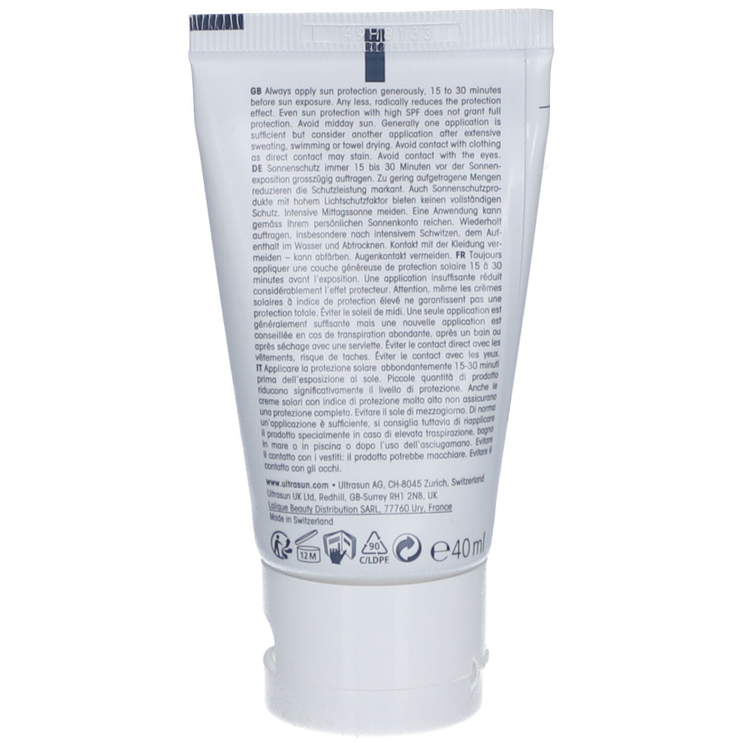 Dos d'un tube blanc avec texte. Contient des informations sur l'utilisation et les ingrédients. Avec indication e40ml.