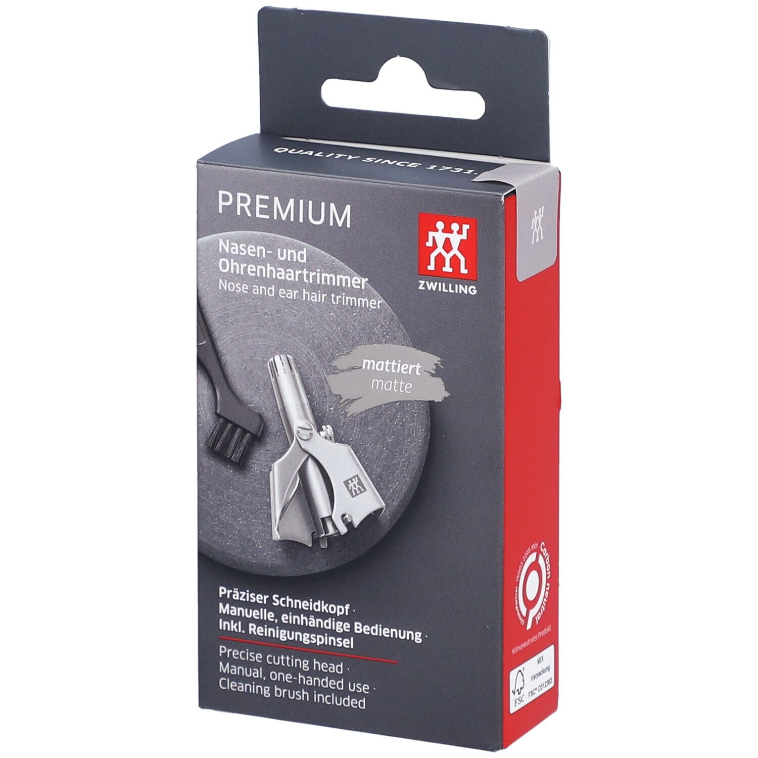 Emballage du ZWILLING Premium. Contient un coupe-poils, une brosse de nettoyage. Boîte noire et rouge.
