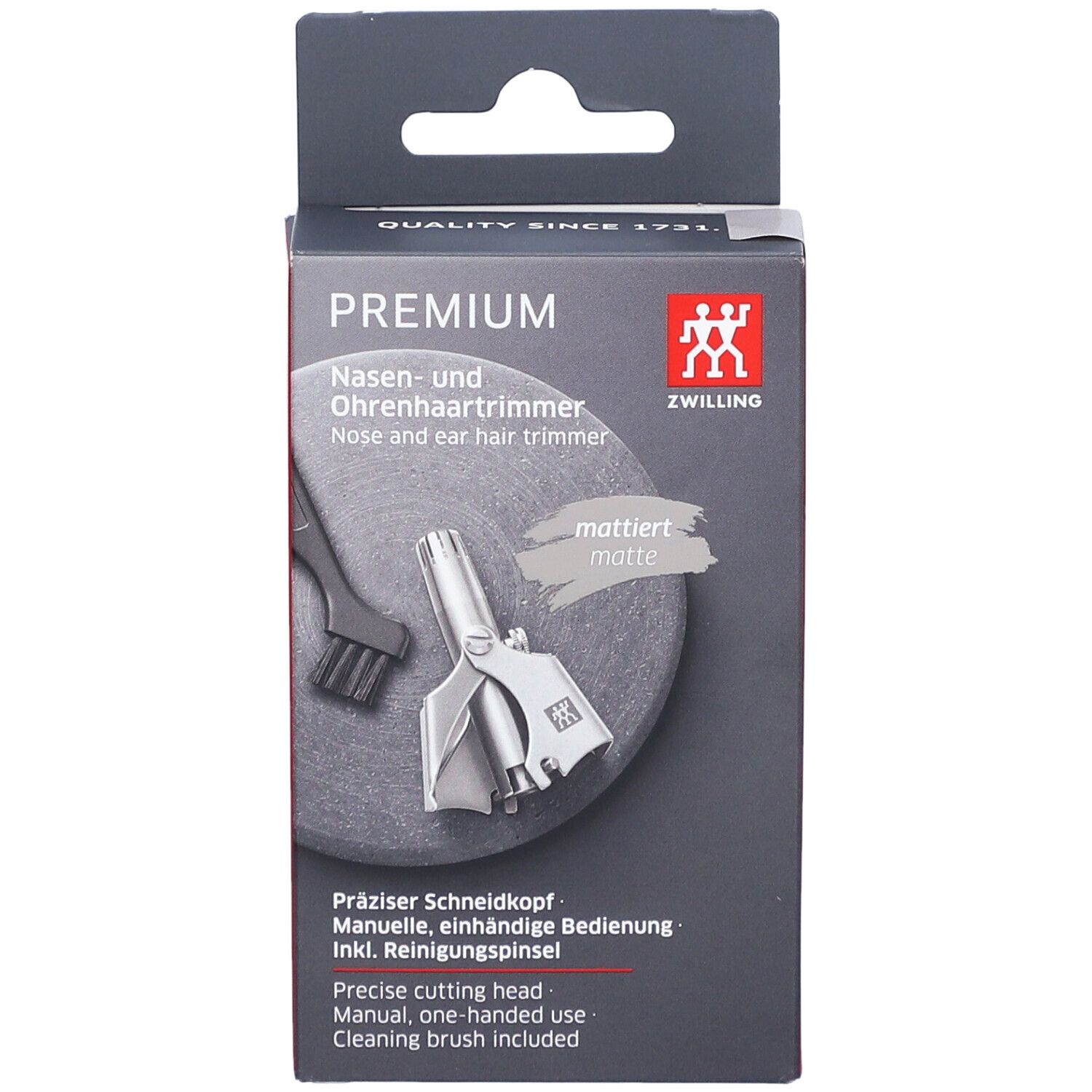 Vue de face de l'emballage ZWILLING Premium. Produit et brosse de nettoyage.
