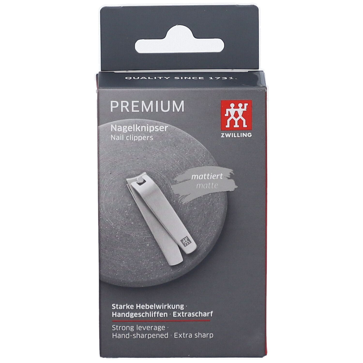 Boîte ZWILLING Premium. Coupe-ongles et texte: "Nagelknipser", "mattiert", "Extra scharf".
