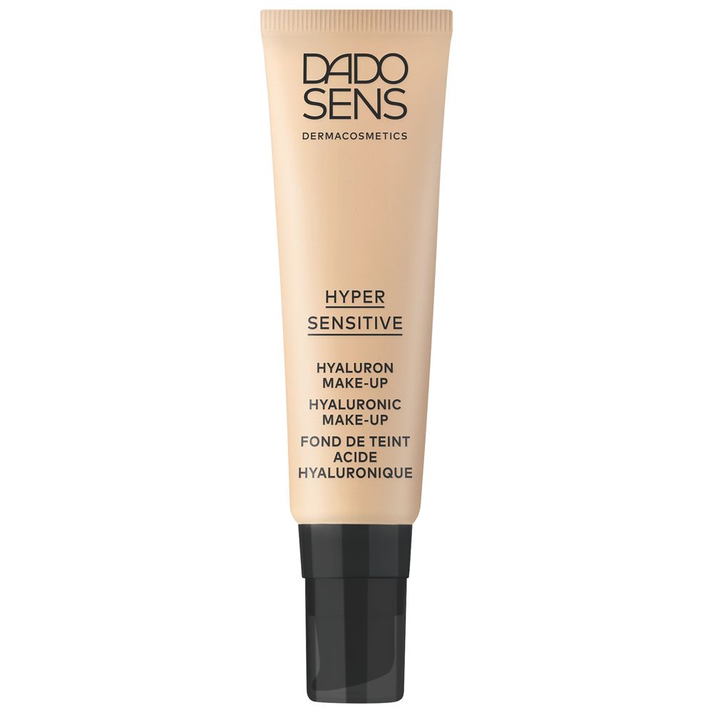 Tube de maquillage DADO SENS HYPERSENSITIVE Hyaluron. Beige, bouchon noir. Texte: HYPER SENSITIVE, HYALURON MAKE-UP, FOND DE TEINT.