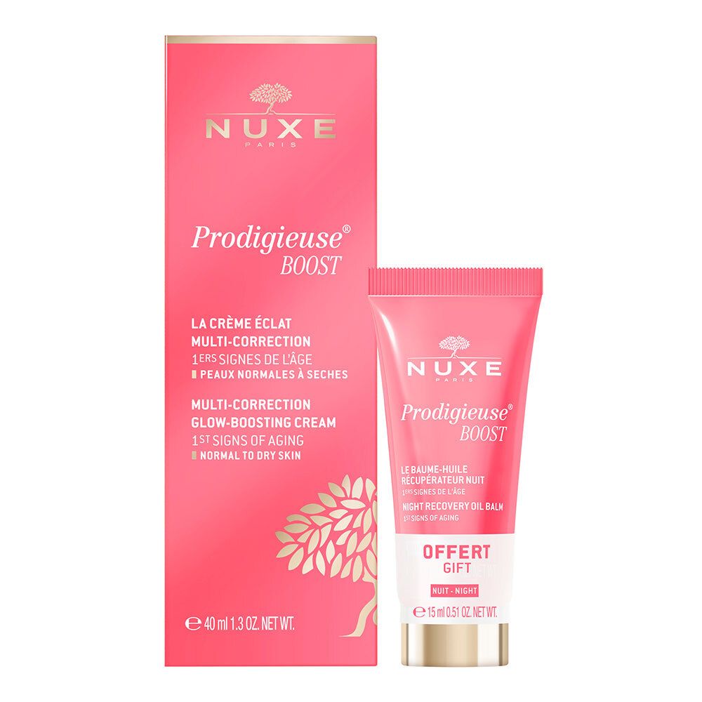 Emballage rose avec crème et baume. Texte: NUXE, Prodigieuse Boost, Multi-Correction. Baume offert.