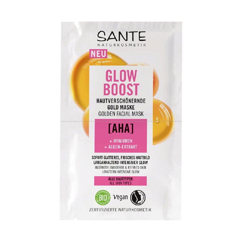 Sachet de masque facial doré. Texte: GLOW BOOST, MASQUE OR SUBLIMATEUR, [AHA], + HYALURON + EXTRAIT D'ALGUES. Labels bio et vegan.
