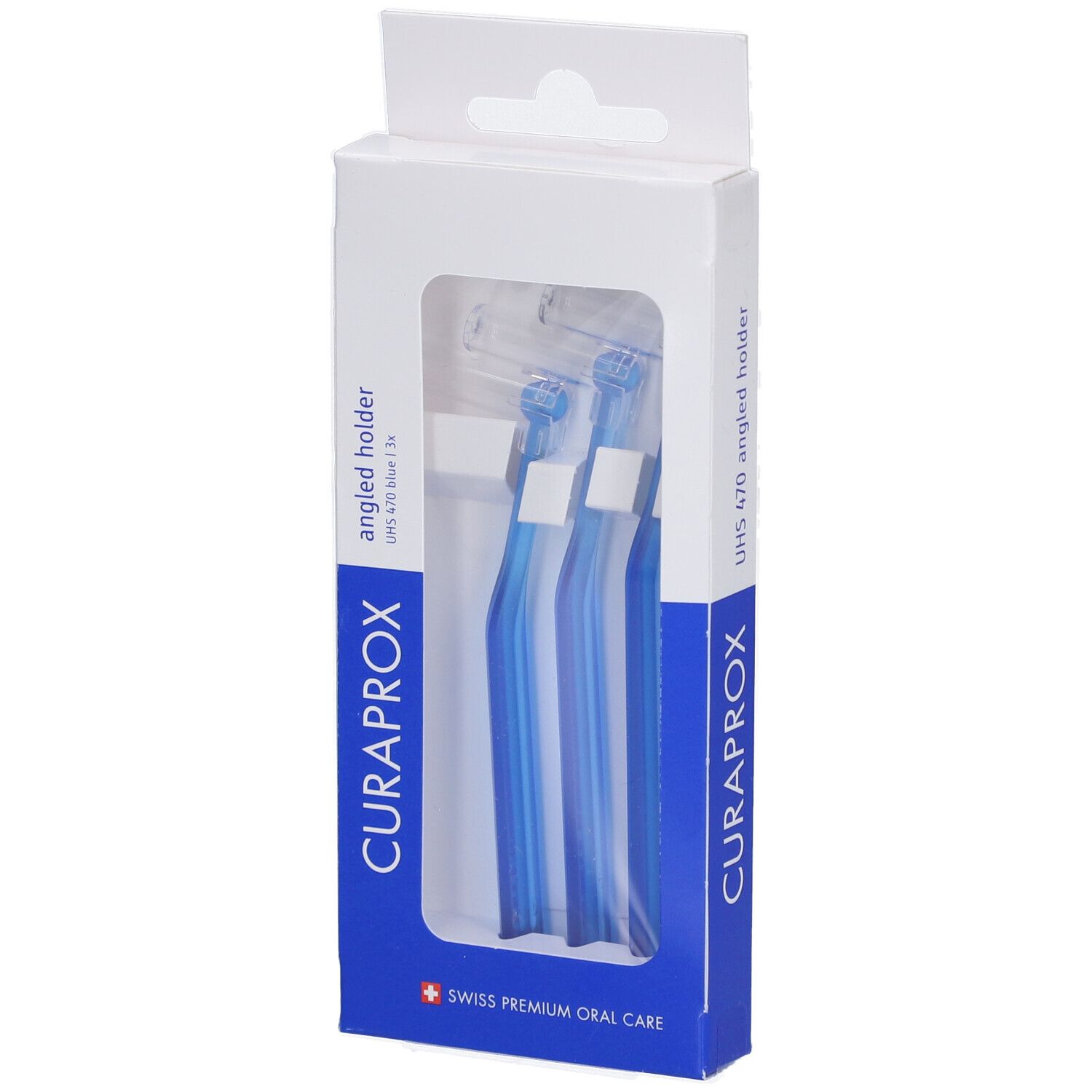 Emballage de supports interdentaires bleus. Visible : CURAPROX, UHS 470, Swiss Premium Oral Care. Trois brosses dans la boîte.