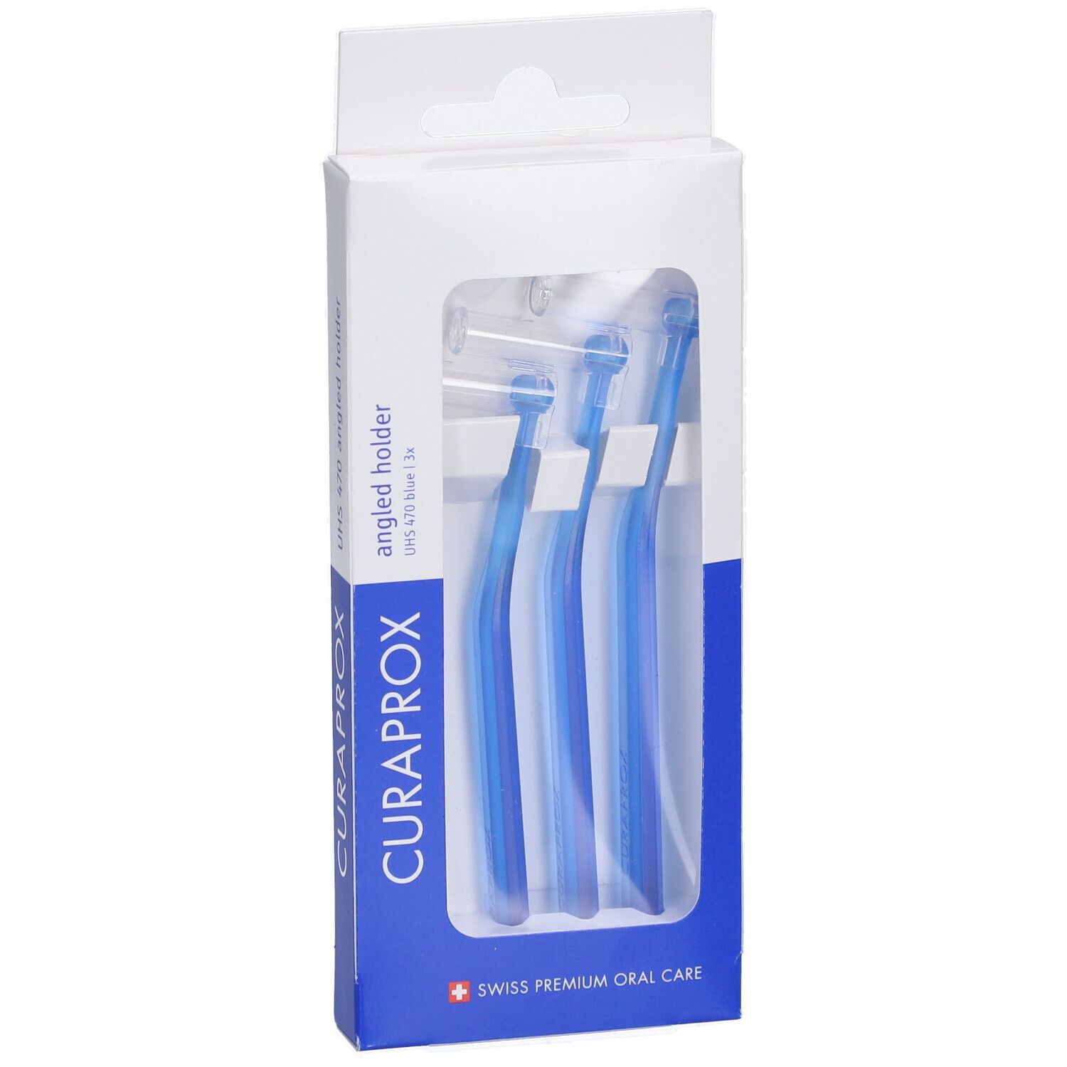Emballage de supports interdentaires bleus. Visible : CURAPROX, UHS 470, Swiss Premium Oral Care. Trois brosses dans la boîte.