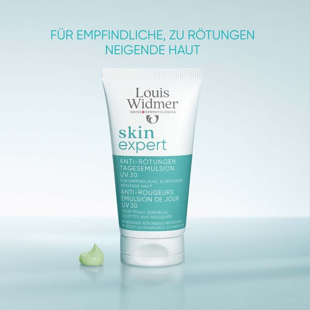Tube Louis Widmer skin expert Anti-Rougeurs Émulsion de Jour UV 30. Crème verte à côté.