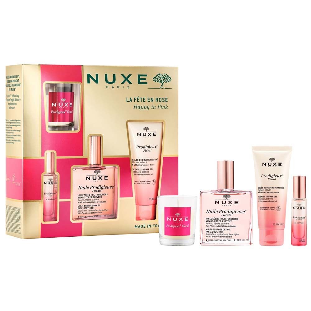 Coffret cadeau NUXE avec huile, gel douche, parfum et crème. Plusieurs produits dans une boîte.