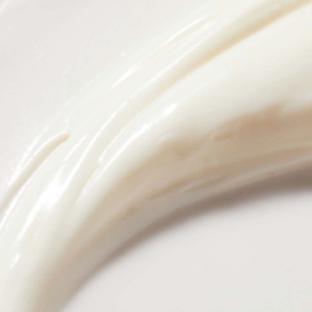Gros plan de crème blanche. Texture lisse. Bande de crème.