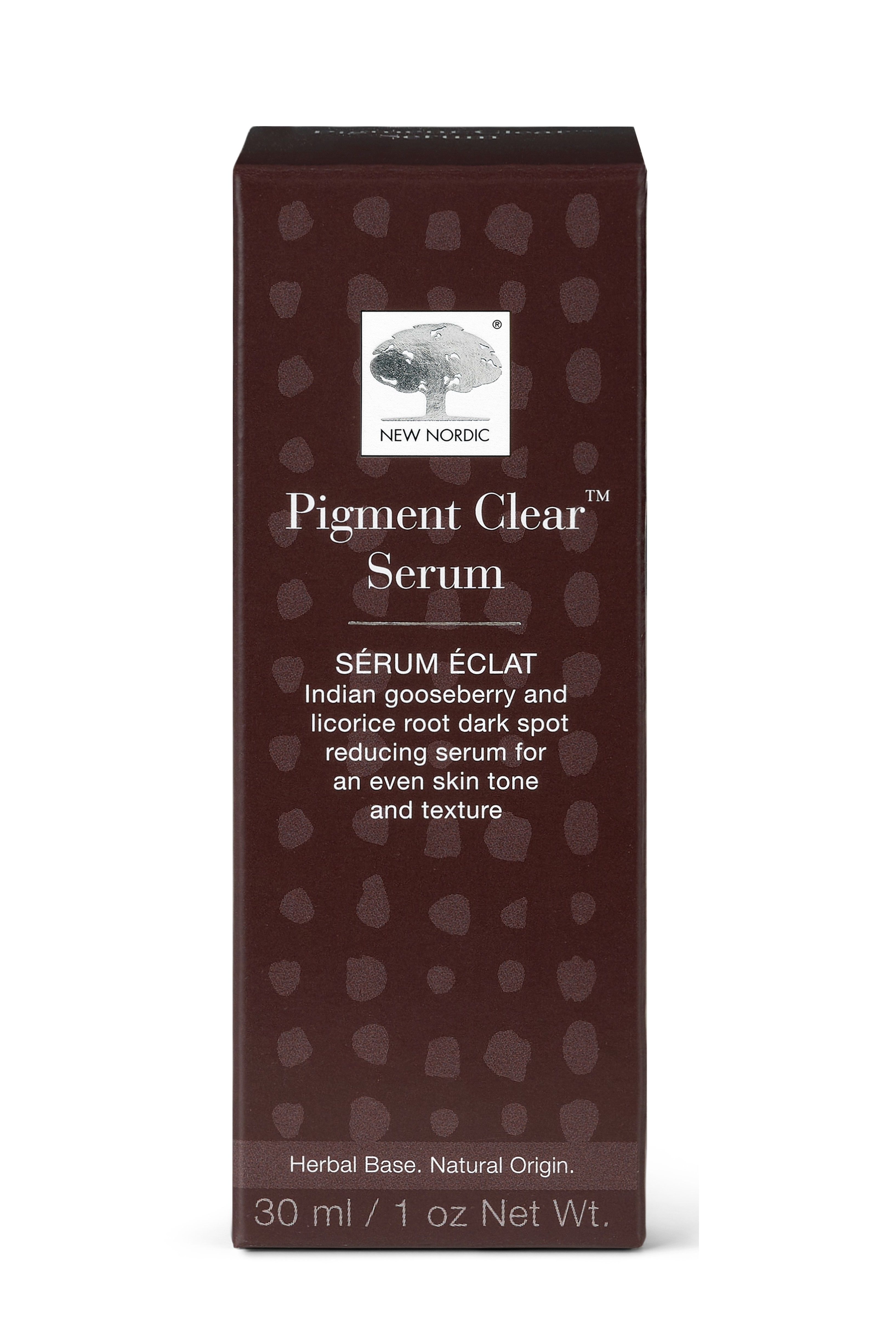 Boîte marron avec nom et logo du produit. Contient du sérum. Texte : Indian gooseberry and licorice root dark spot reducing serum.