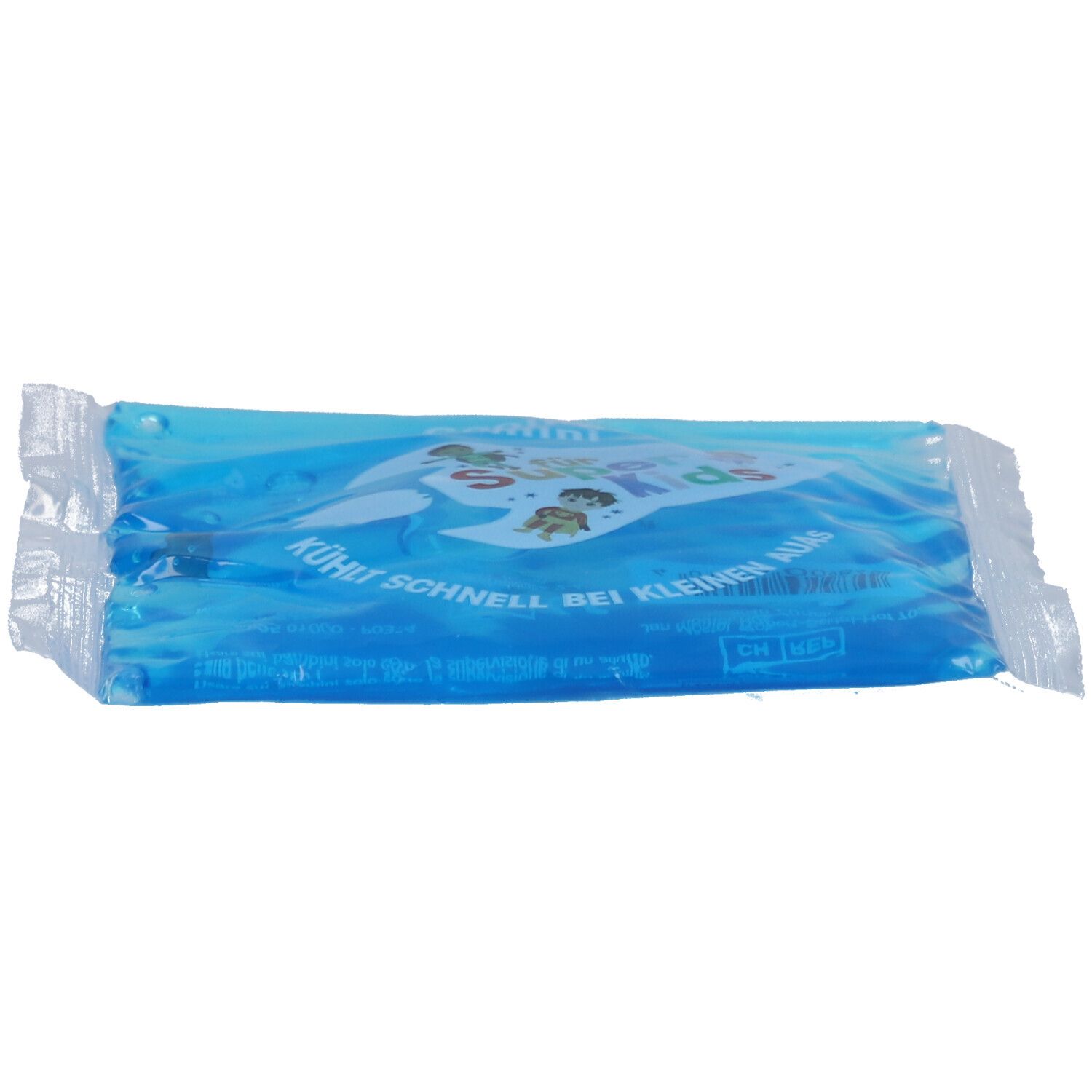 Pack de refroidissement bleu dans un emballage plastique. Inscription : Super Kids. Texte : Refroidit rapidement pour les petits bobos.