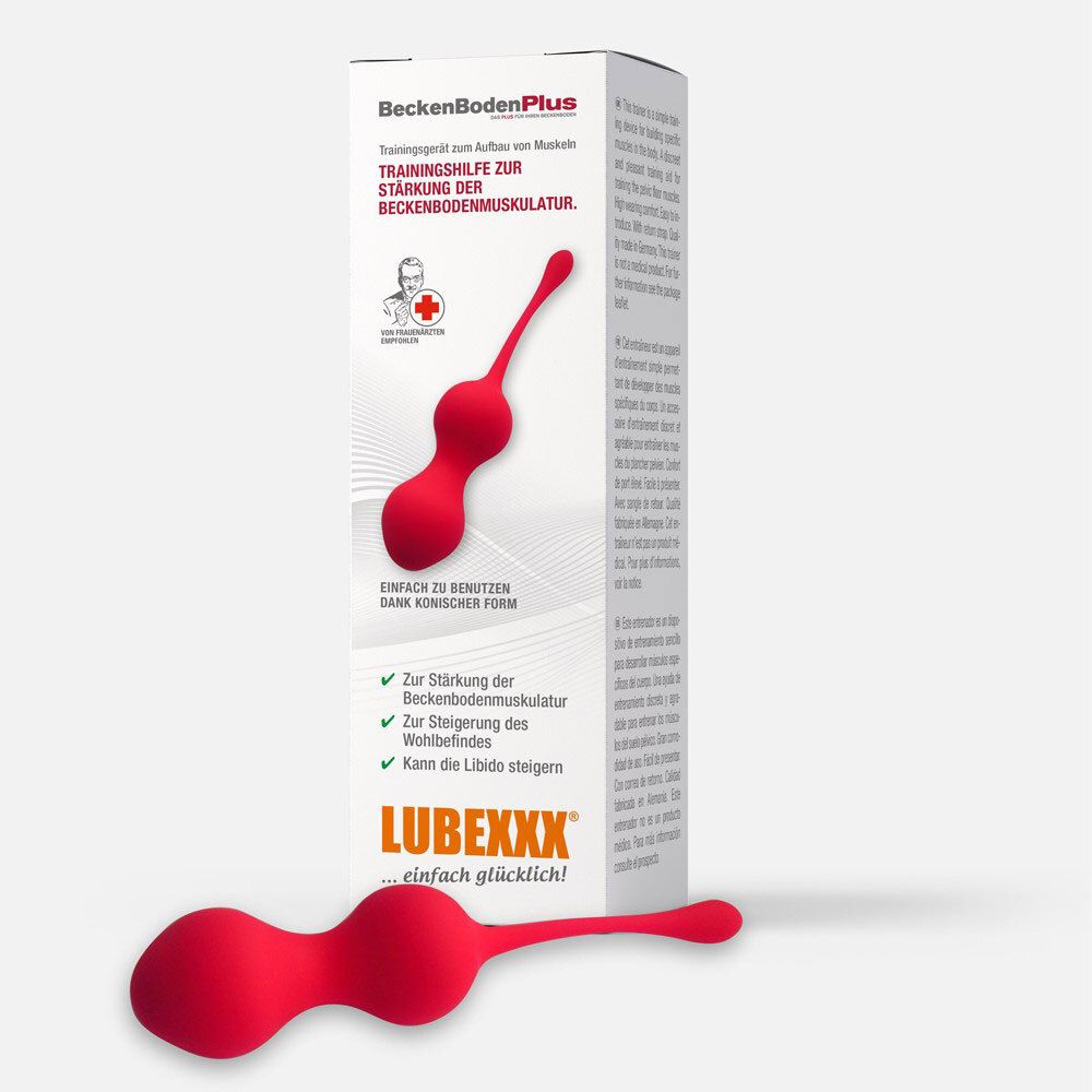 Appareil d'entraînement rouge, forme conique, avec cordon. Inscription LUBEXXX. Emballage avec informations.