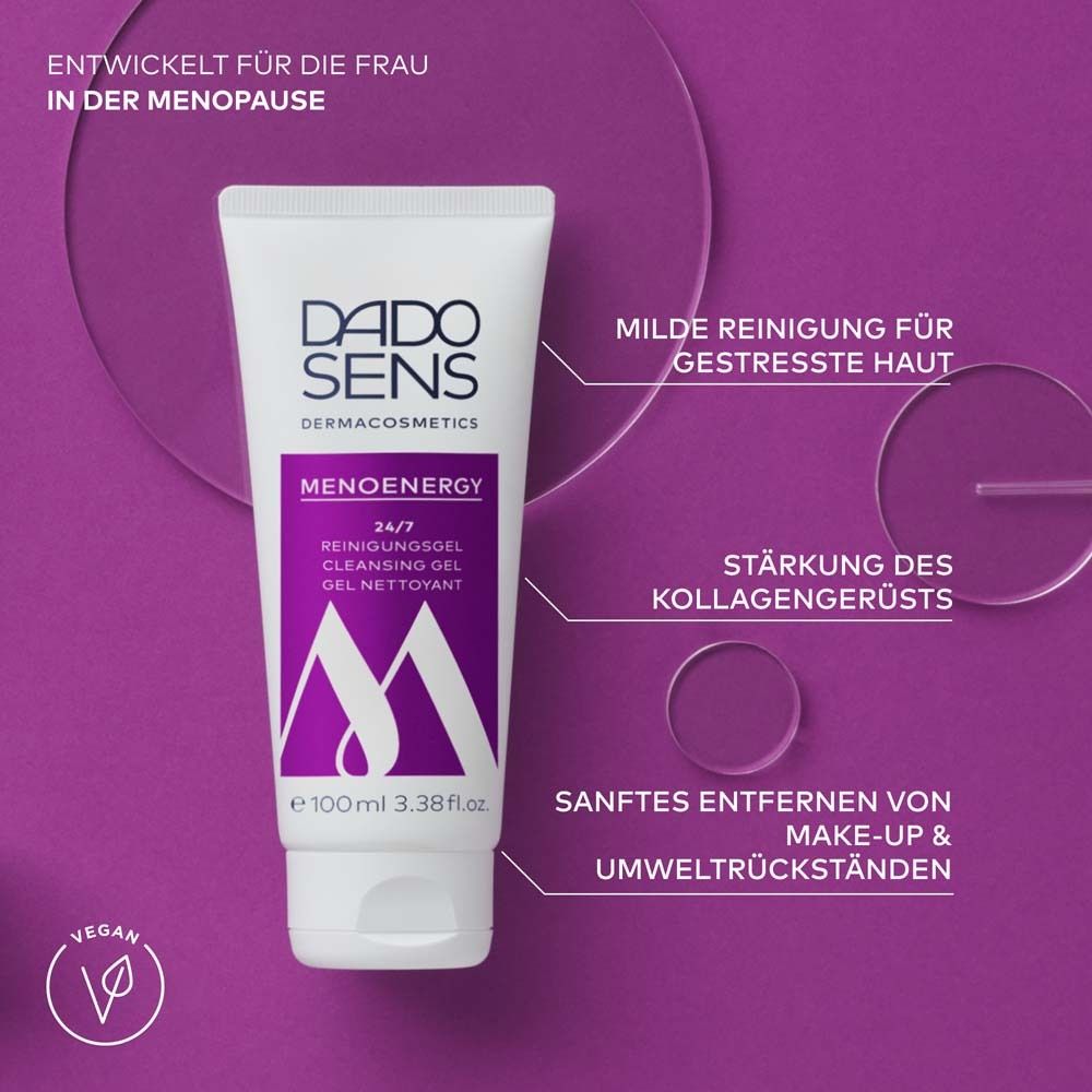 Tube blanc, impression violette. Texte : Menoenergy, gel nettoyant. Marque : DADO SENS. Fond violet.