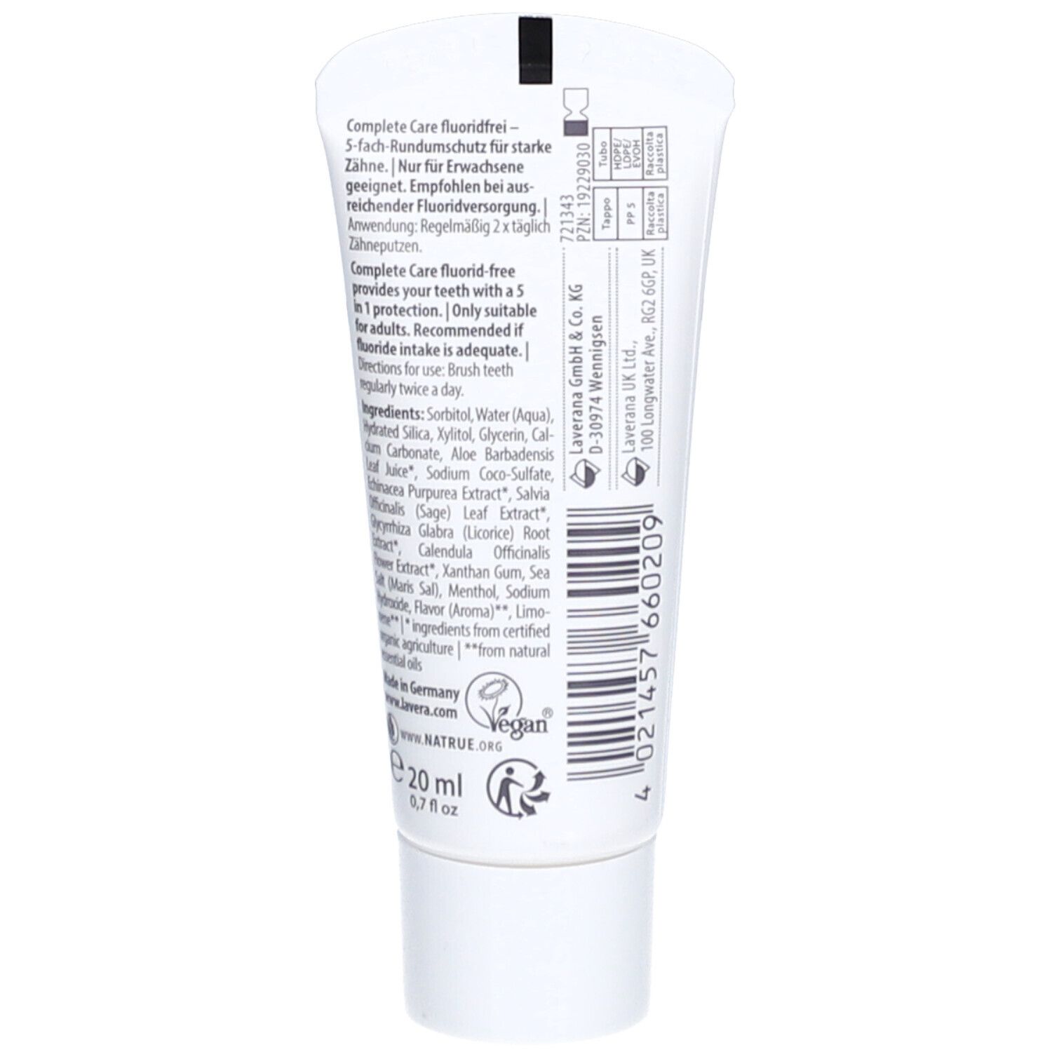 Tube blanc de 20 ml de dentifrice Complete Care sans fluorure. Contient les ingrédients et les instructions d'utilisation.