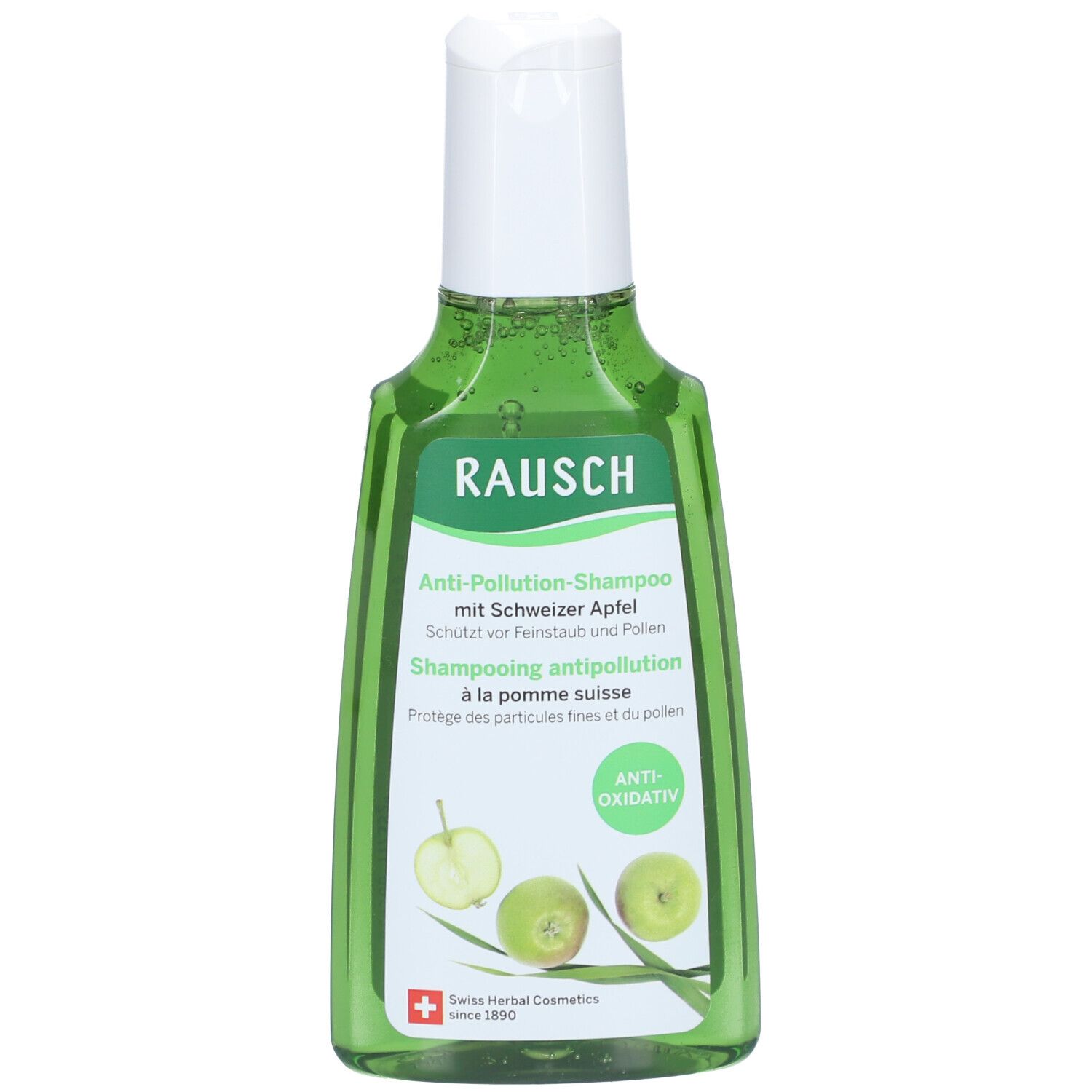 Flacon vert de shampooing RAUSCH Anti-Pollution. Bouchon blanc. Étiquette avec nom du produit, pommes et logo.