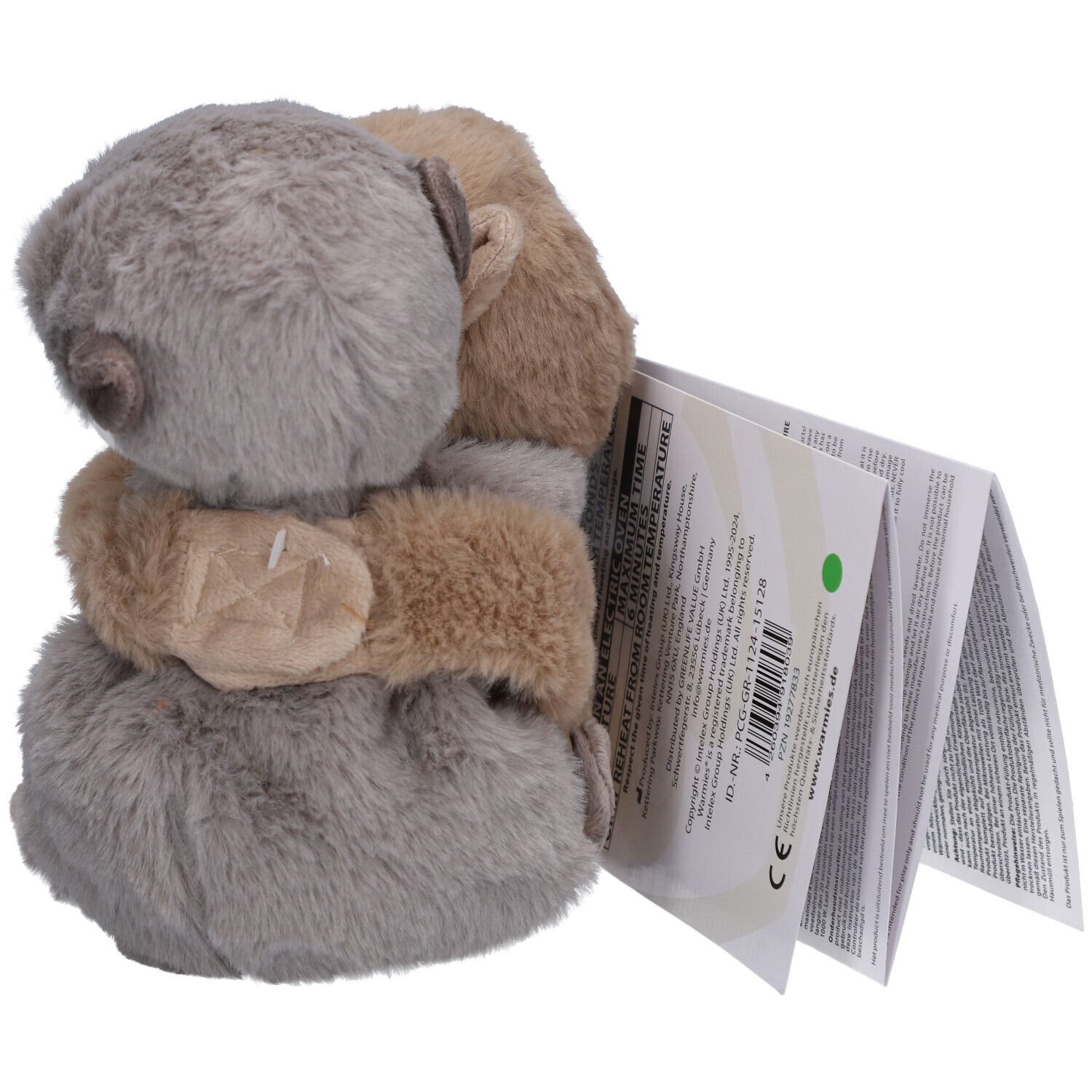Deux loutres en peluche, beige et grise, s'embrassent. Avec étiquette.