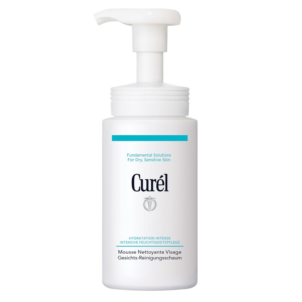 Distributeur blanc avec accent bleu. Inscription : Curél, Mousse Nettoyante Visage, Gesichts-Reinigungsschaum.