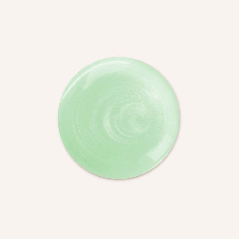Goutte vert clair. Forme ronde. Sur fond clair.
