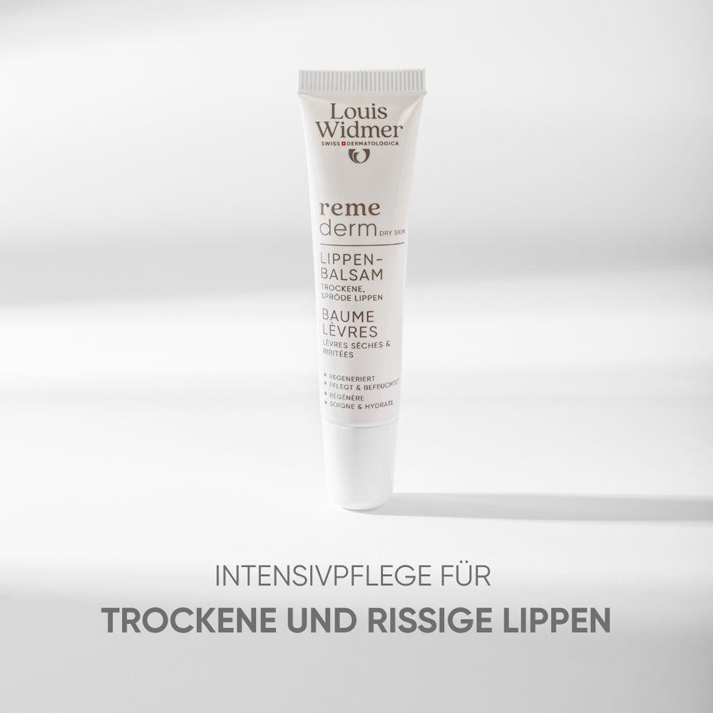 Tube blanc de baume à lèvres. Inscription: Louis Widmer, remederm dry skin, Lippenbalsam, lèvres sèches et gercées. Texte: Soin intensif pour lèvres sèches et gercées.