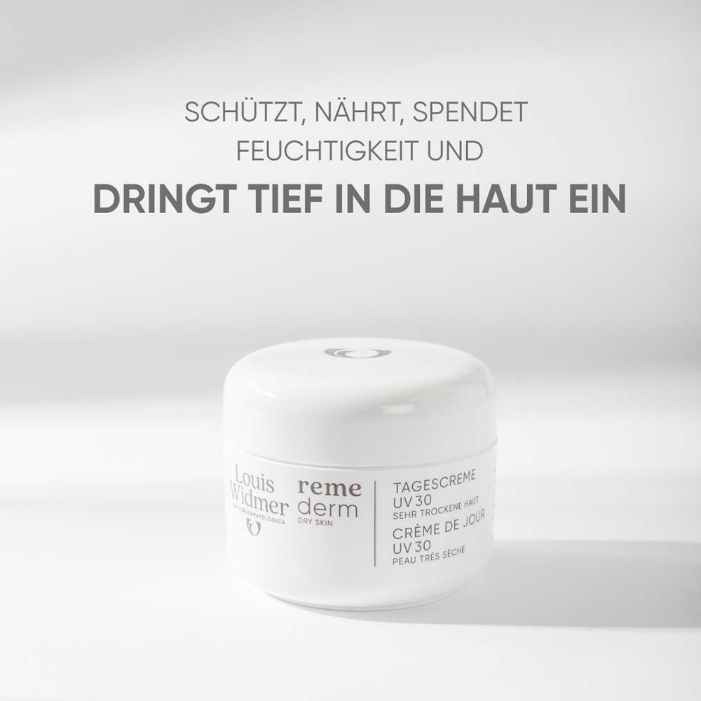 Pot de crème blanc. Texte: Protège, nourrit, hydrate et pénètre profondément dans la peau. Nom du produit: Crème de jour UV 30.